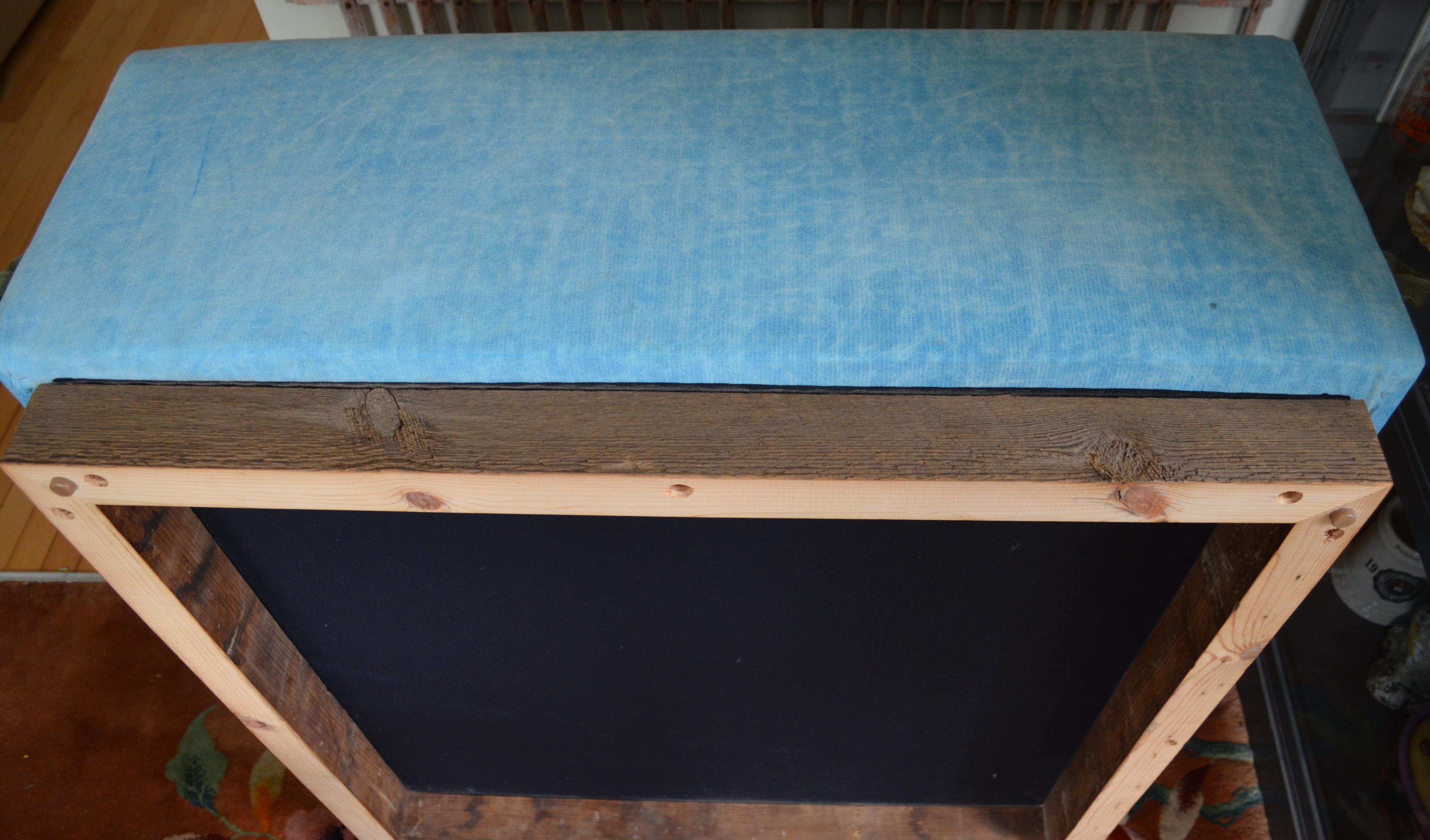 Ottoman Coffee Table Upholstered in 1960s Blue Tent Canvas Atop Barn Wood Base For Sale 9