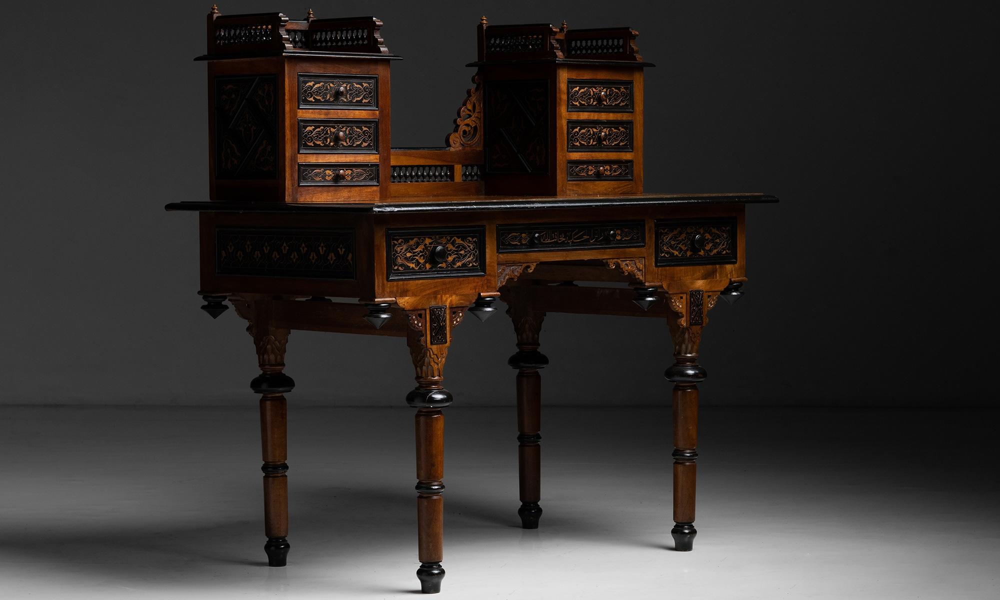 Ottoman empire desk.

Turkey, circa 1895.

Ottoman era desk with inlaid and carved details to all sides.

Measures: 47”L x 27.5”D x 47”H.