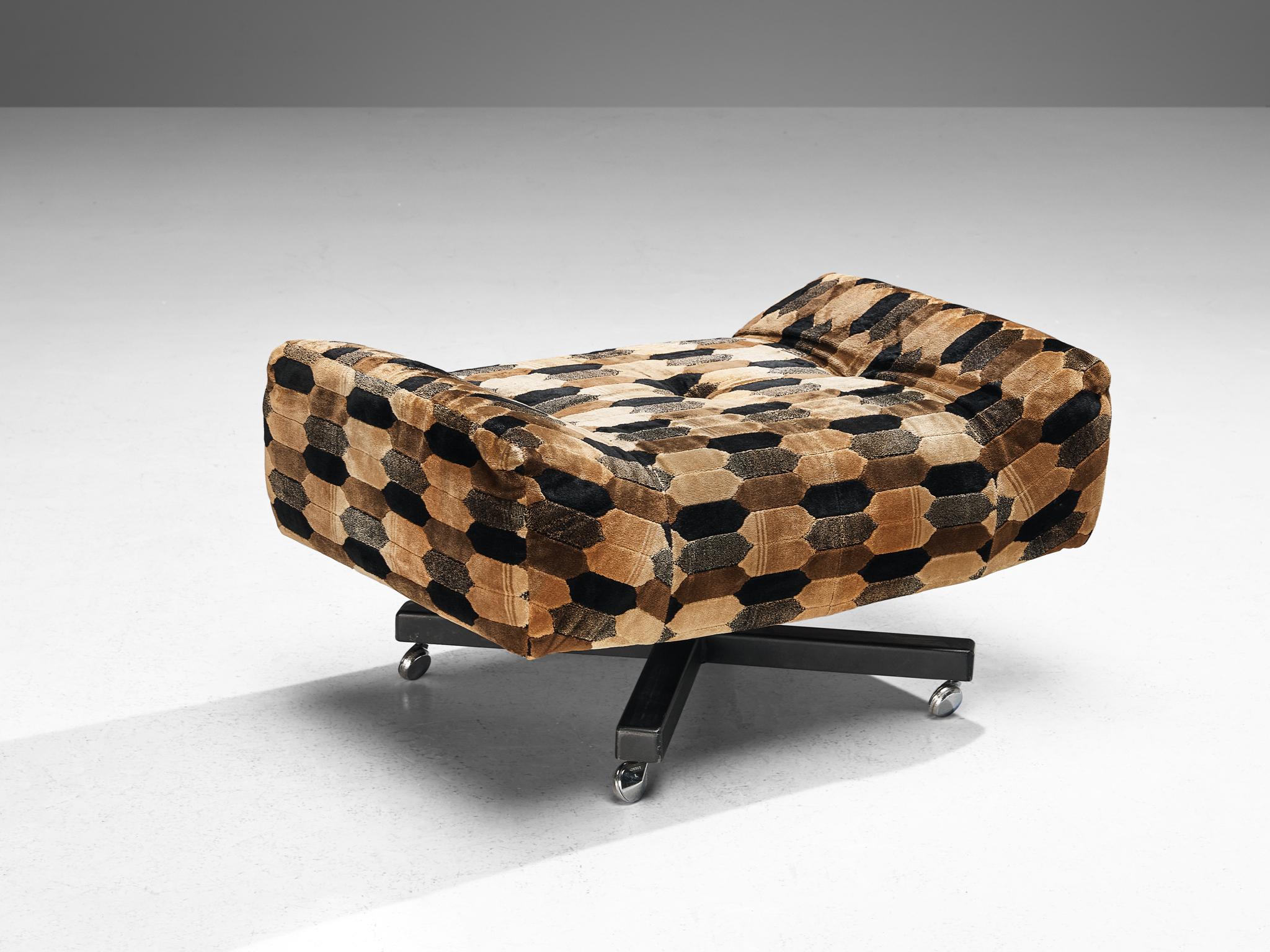Ottoman or footrest, steel, fabric, Europe, 1970s

This comfortable ottoman is made in Europe in the 1970s. The colorful silk upholstery catches the eye of this piece. Neutral tones of brown and black create an interesting and comfortable piece for