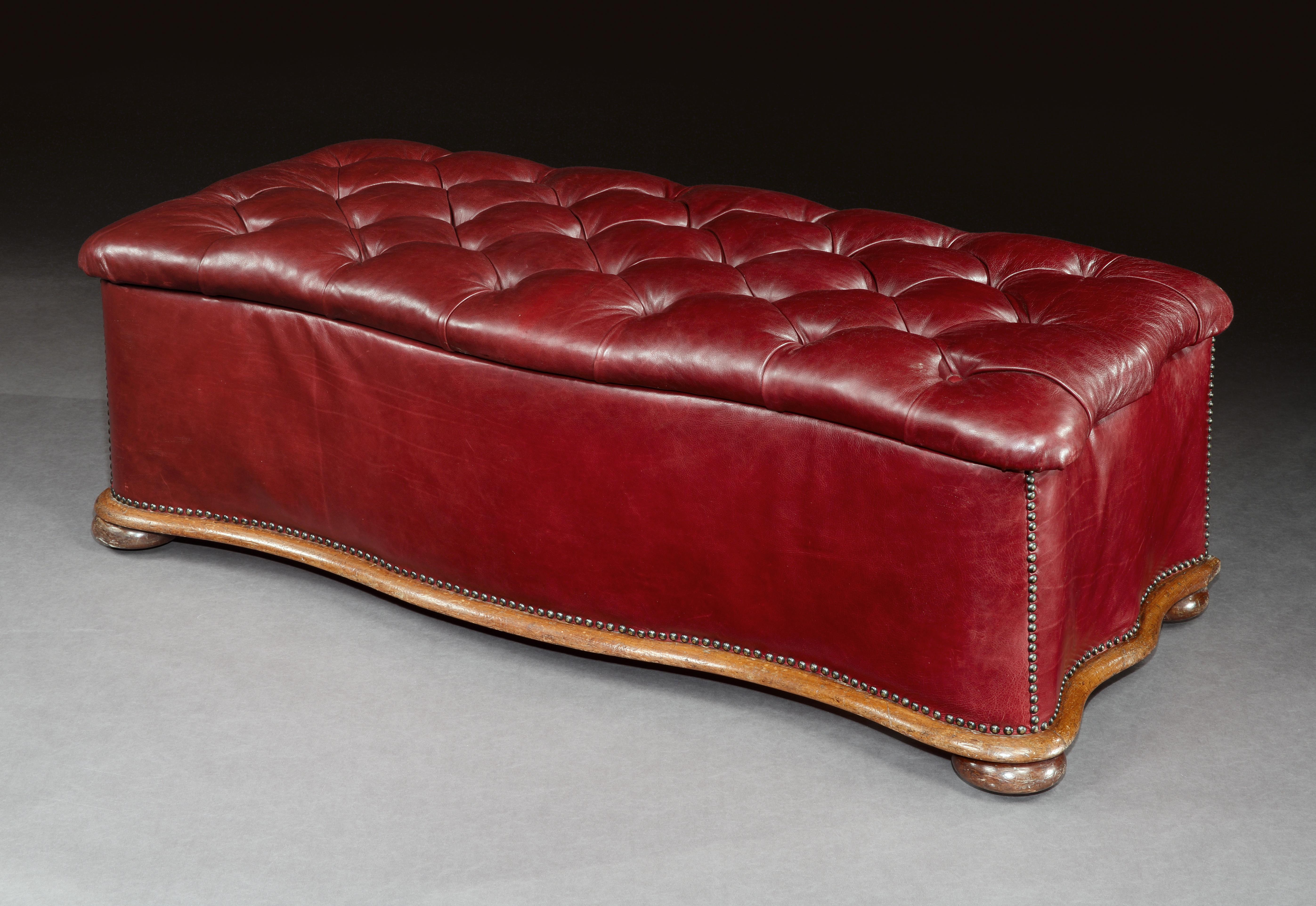 Serpentine-shaped ottoman, mid-19th century, English, Victorian, with mahogany skirt and feet and upholstered in burgundy leather

This handsome ottoman is really practical offering both seating and storage space. It is traditionally upholstered