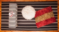 Ottoman or Pouf Upholstered with a Vintage Anatolian Angora Filikli Rug