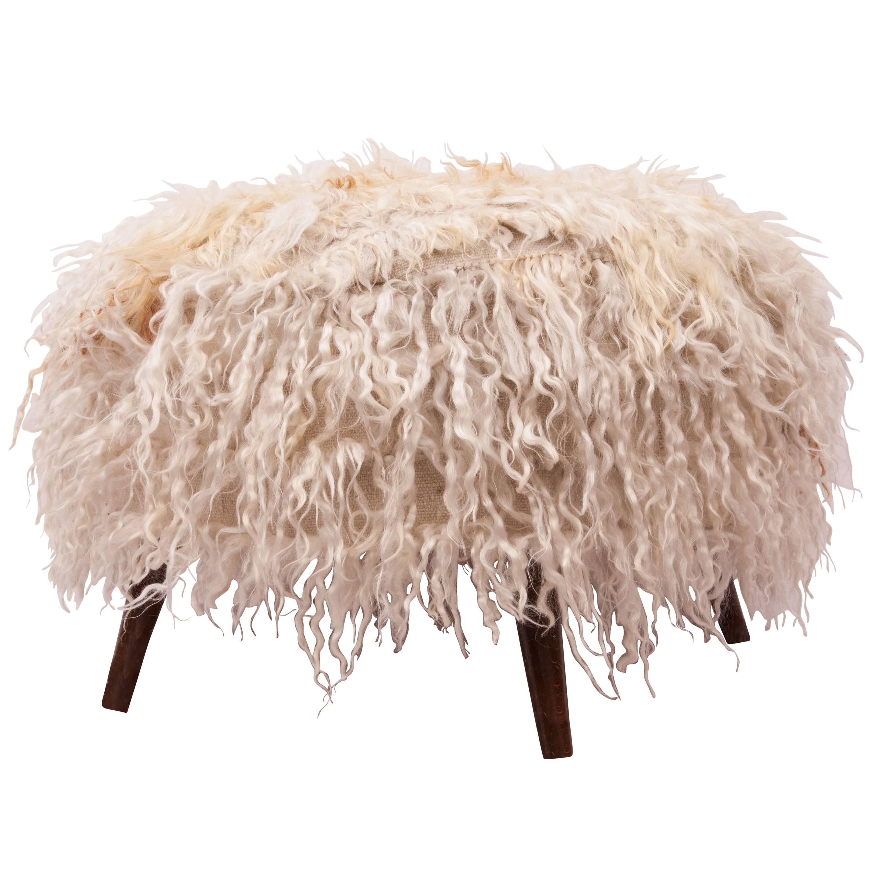 Ottoman or Pouf Upholstered with a Vintage Anatolian Angora Filikli Rug