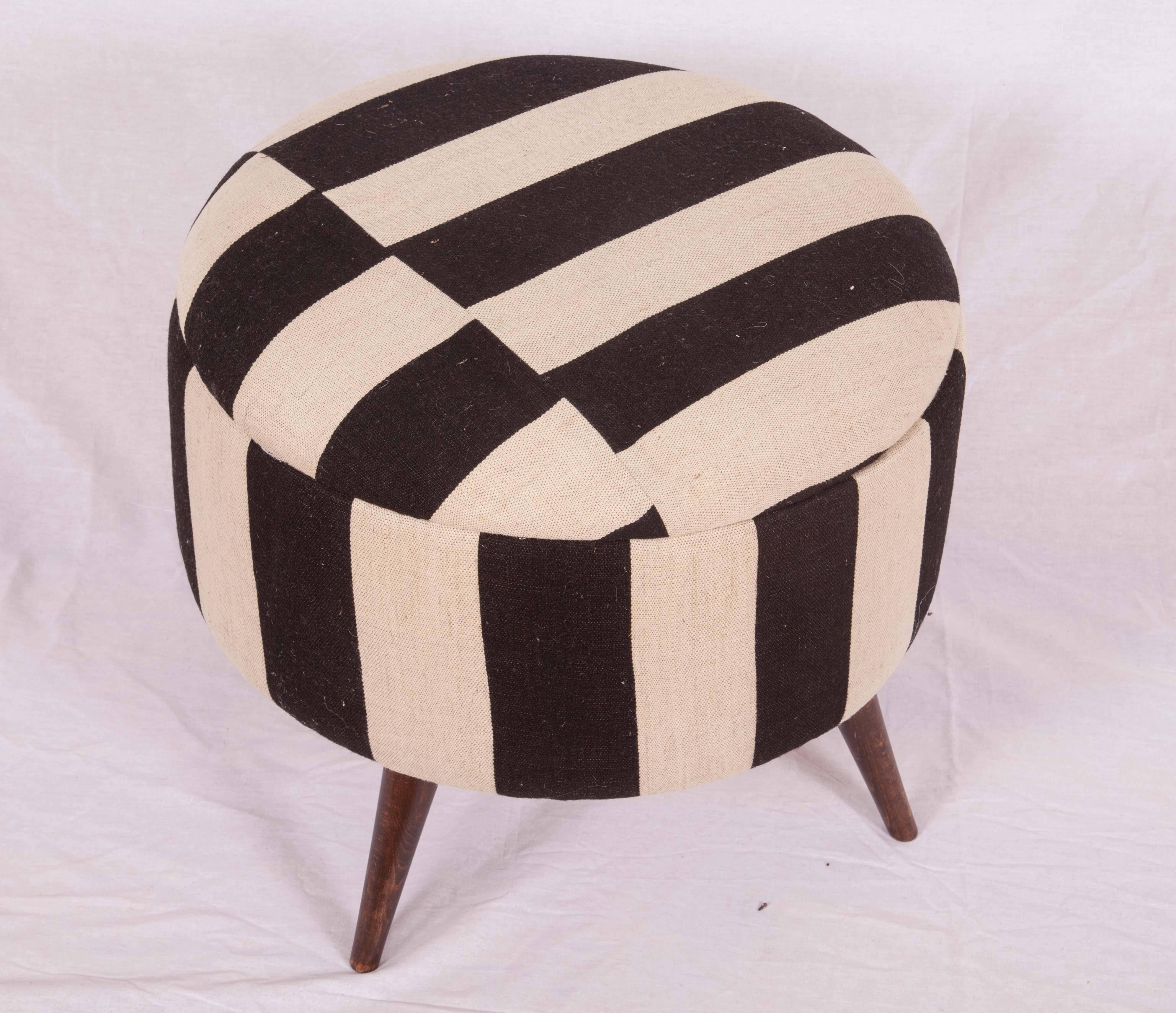 Ottoman, pouf, stools upholstered with a vintage cover from Mazandaran.