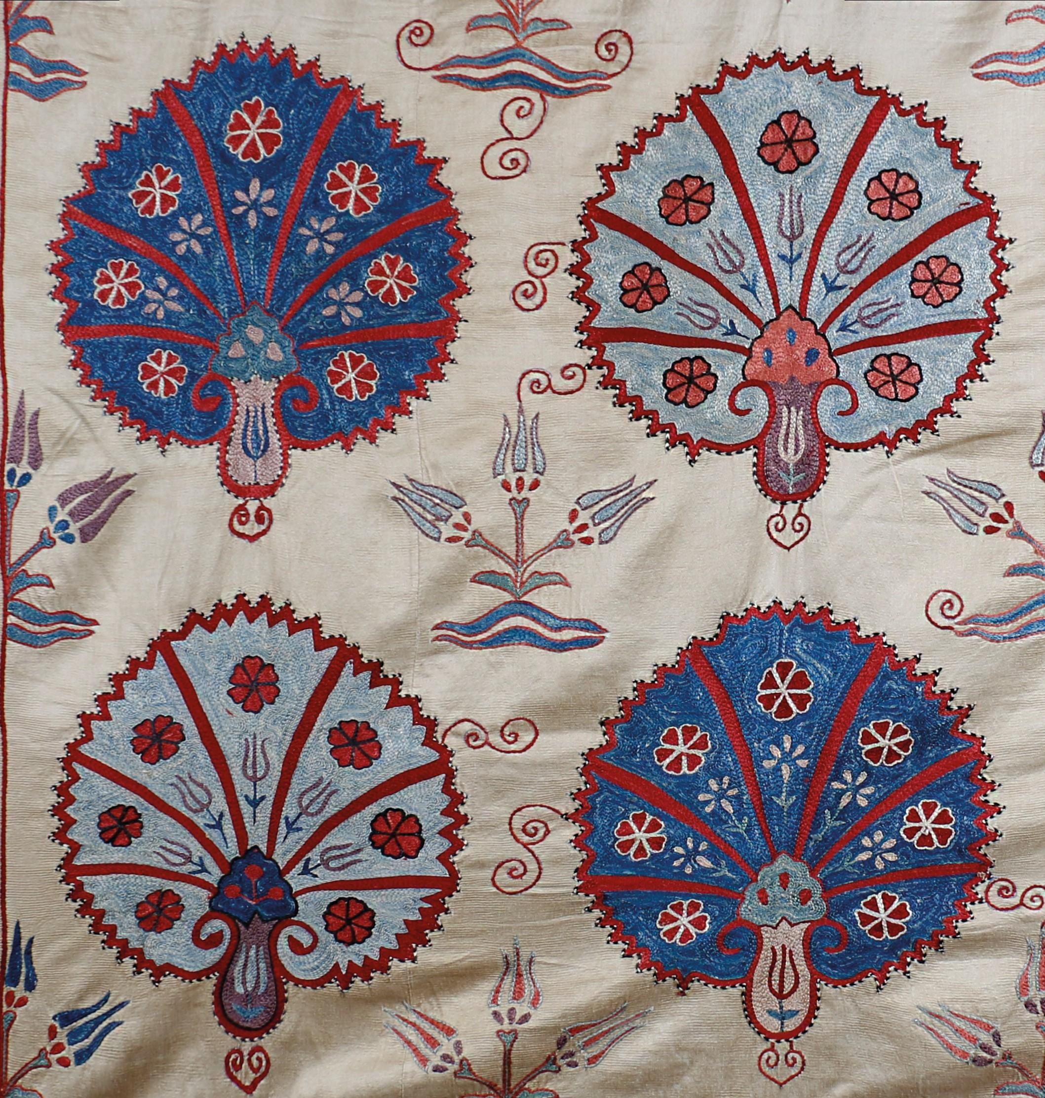 Discover the epitome of luxury with our Ottoman Carnation Motif Hand Embroidered Silk Suzani Tapestry. This exquisite piece features intricate carnation motifs, meticulously hand-embroidered with silk on silk textile. Transform your bedroom into an