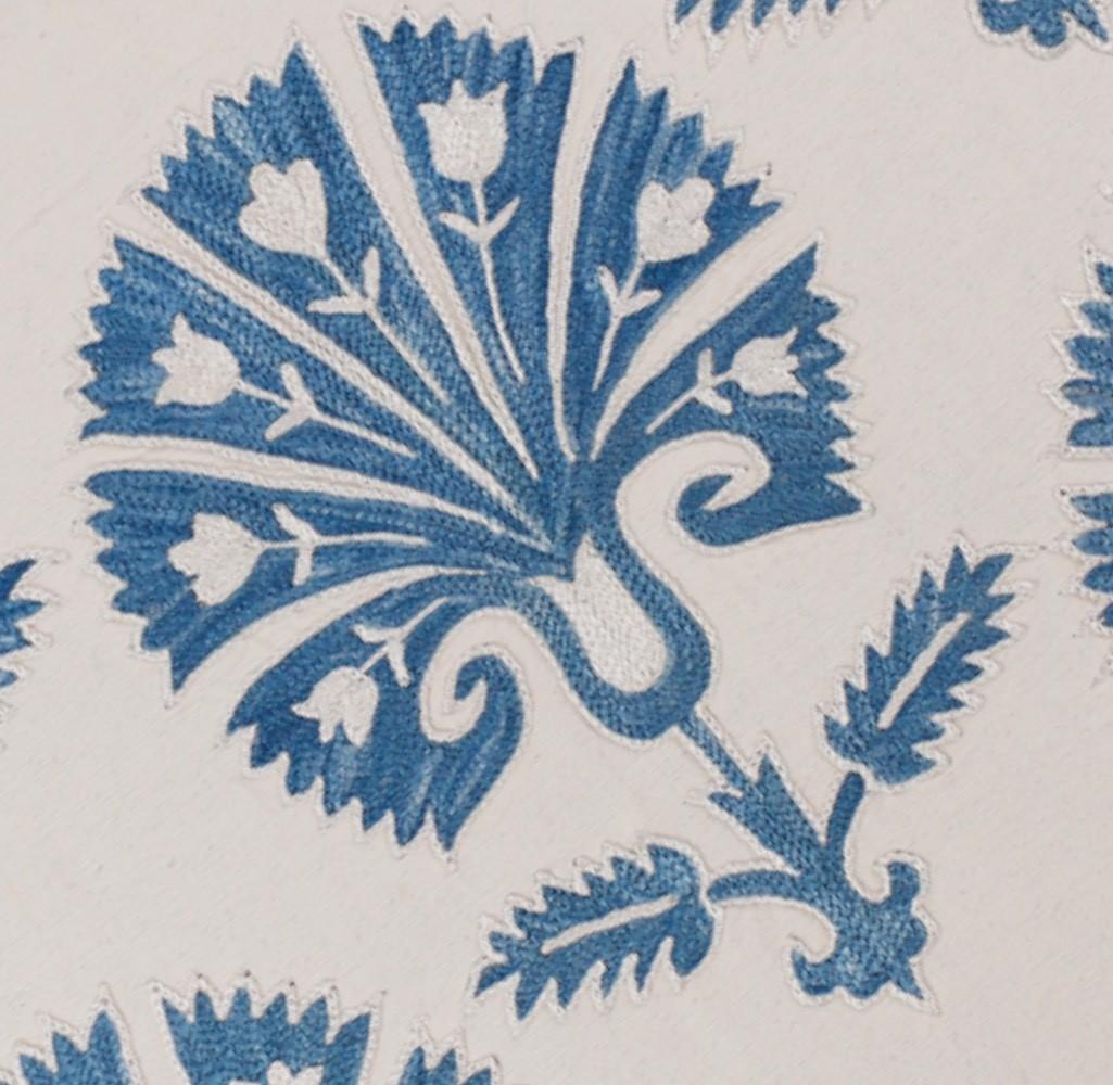The Ottoman Carnation Motif Silk Suzani Hand-Embroidered Cushion is a masterpiece of traditional craftsmanship, bringing the rich heritage of Ottoman textile art into contemporary interiors. The carnation motif was a beloved design element in