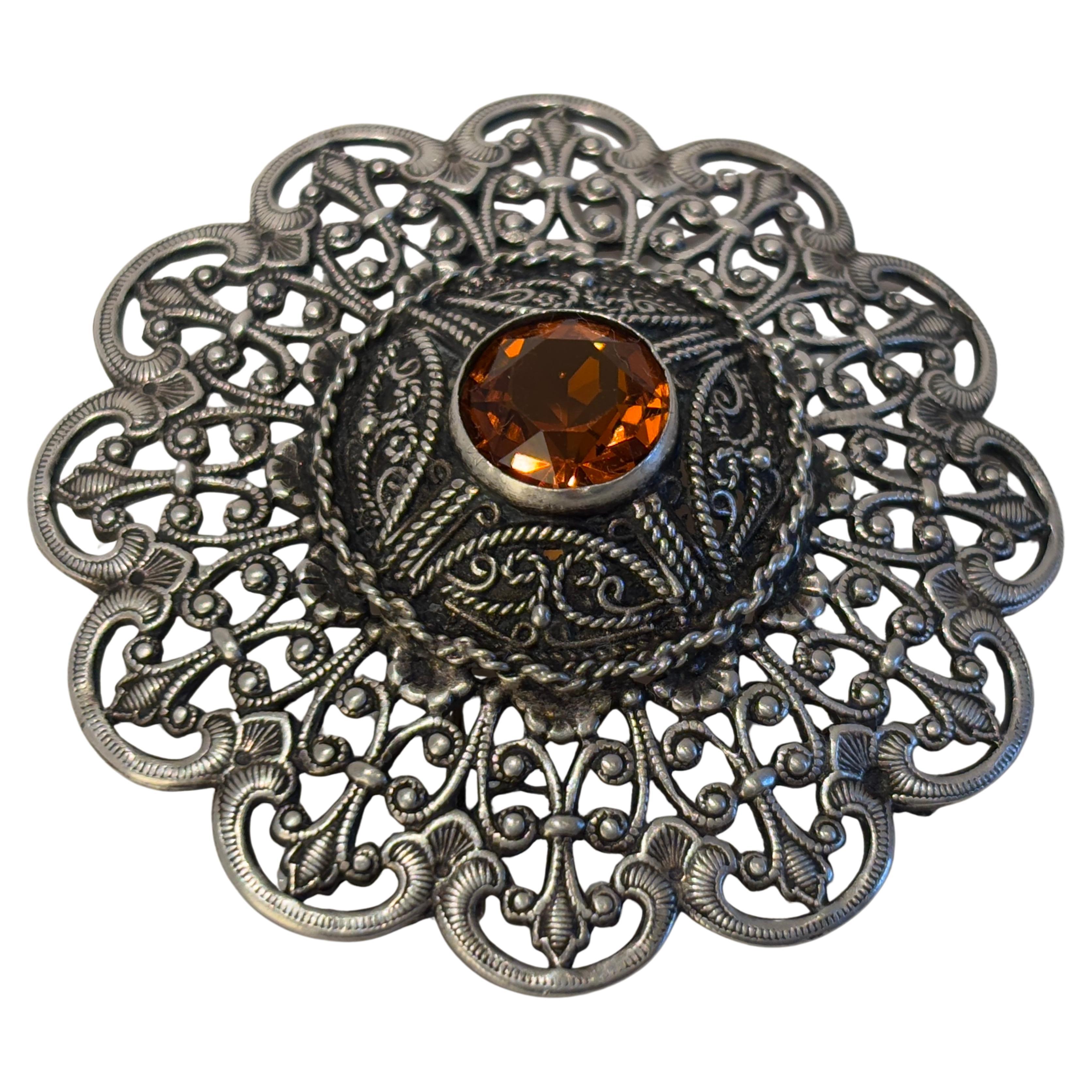 Collectible ottoman style Turkish German silver brooch or veil pin.
Moorish Filigree Lace Brooch Pin, openwork lace with filigree borders.
Middle Eastern Turkish collectible silver jewelry brooch pin in circular form.
Stunning vintage 1940s brooch