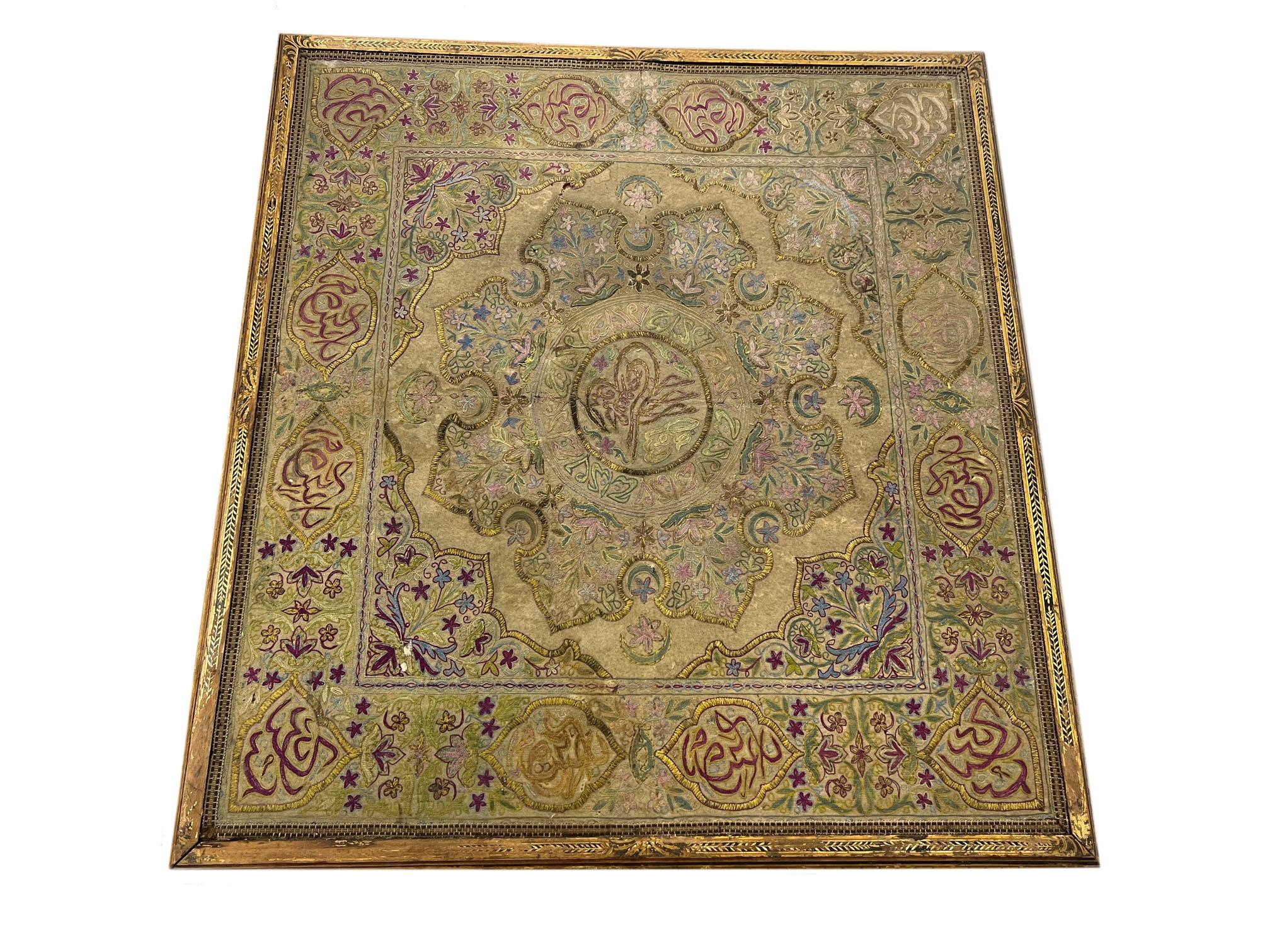 The table is all hand-painted in a traditional Turkish style with antique woven fabric attached to the top of this table that shows the Turkish tughra emblem. The fabric is circa 1750 and the table circa 1860, Ottoman Turkey. Good color and in great