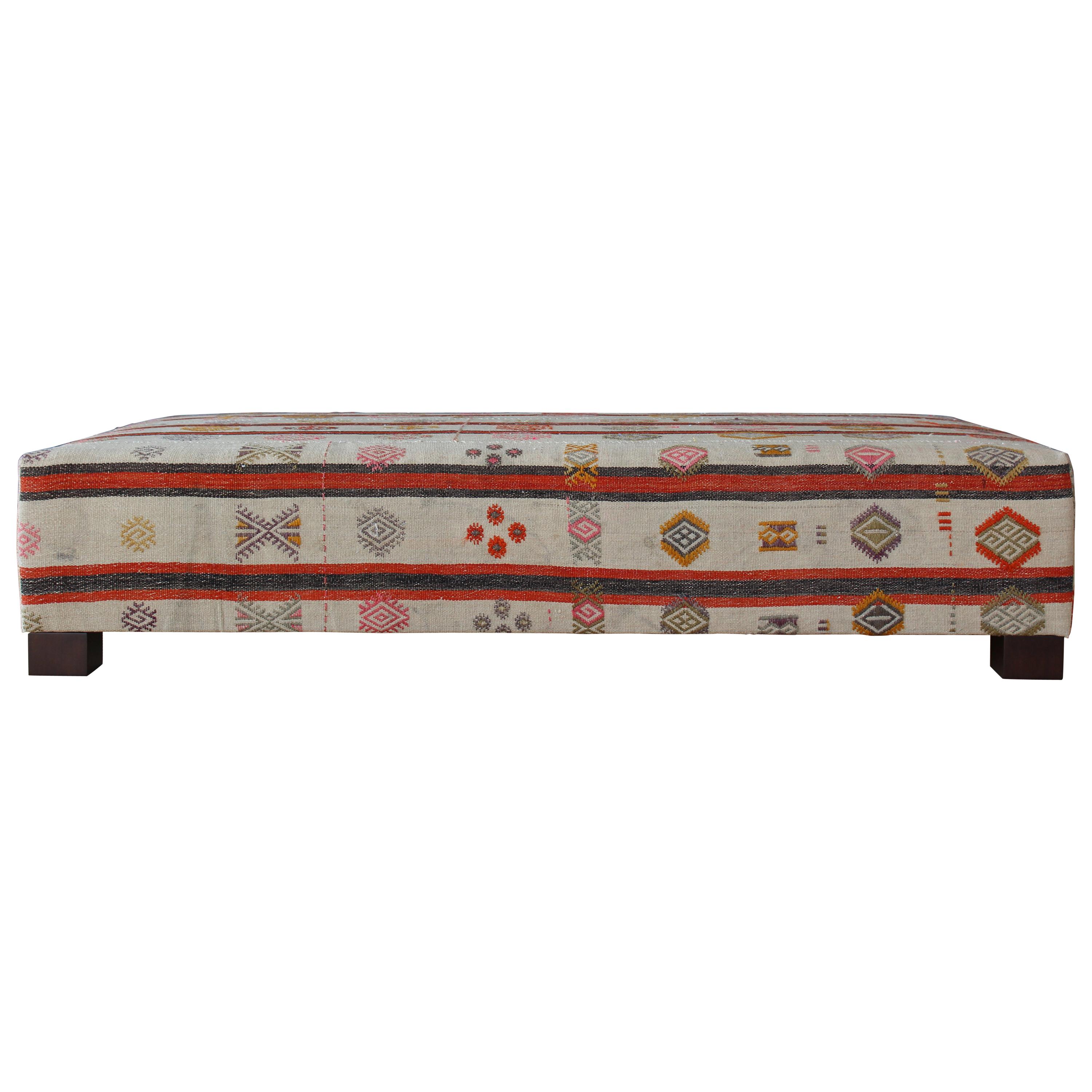 Ottoman Upholstered in a Vintage Rug