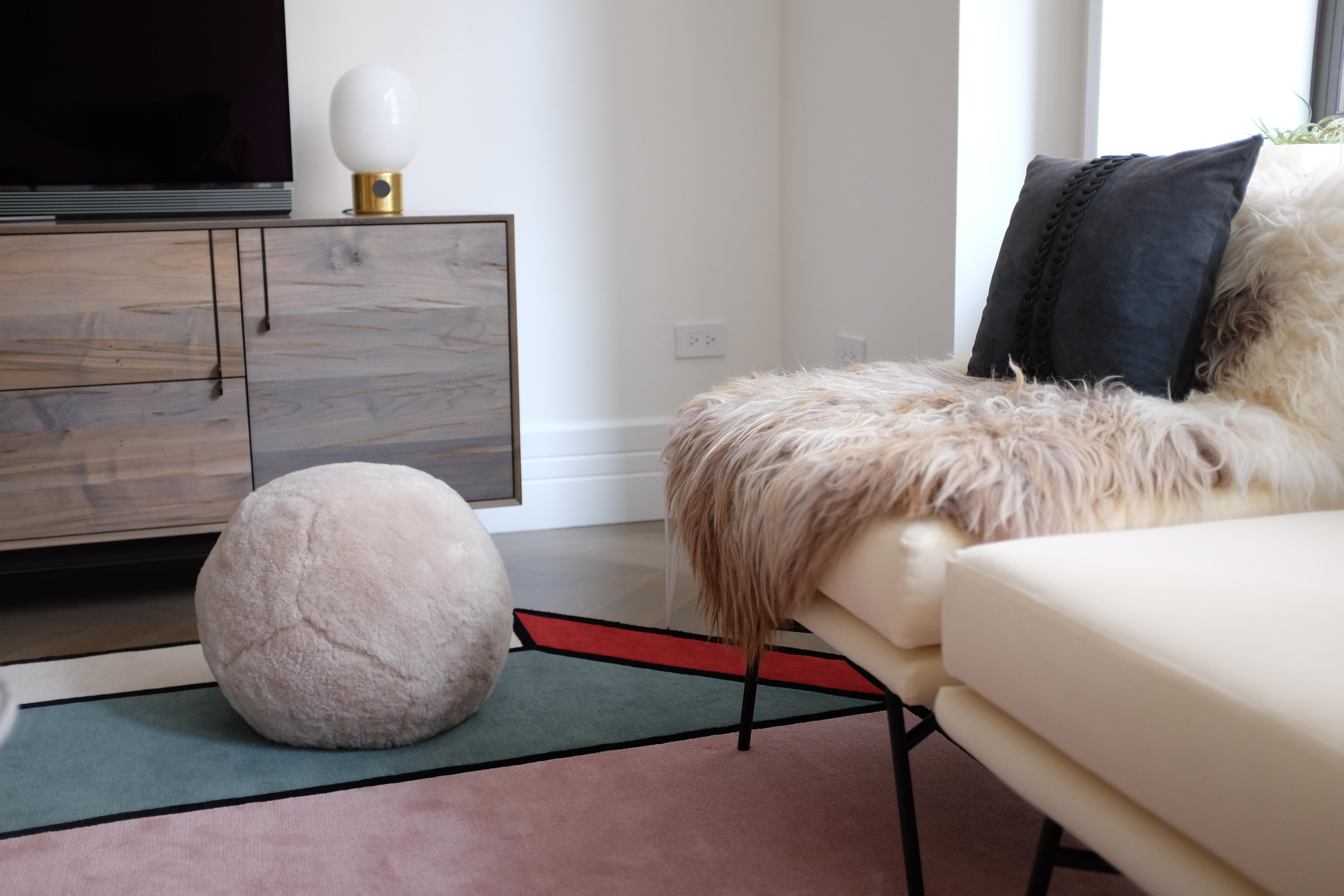 Round, sculptural and uniquely abstract, crafted with our plushest shearling, the Ottoman X is the coziest of our ottoman collection.

Construction: Handcrafted to order in Long Island, NY. Our ottomans are hand-filled with compressed foam and