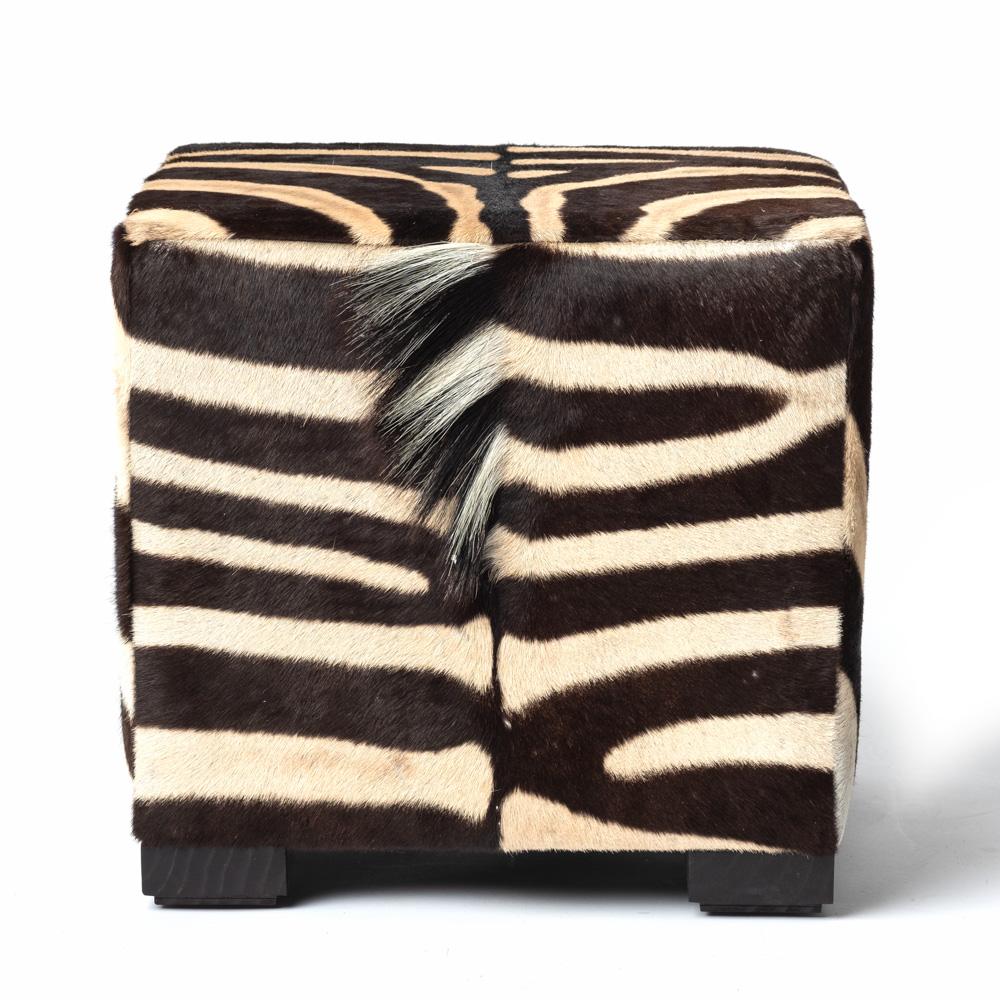 This Zebra hide cube ottoman provides a true ‘out of Africa’ sense to any space. Each ottoman has been upholstered with ethically and sustainably-sourced Burchell's Zebra hide. Due to the use of natural materials, each piece is unique and may vary