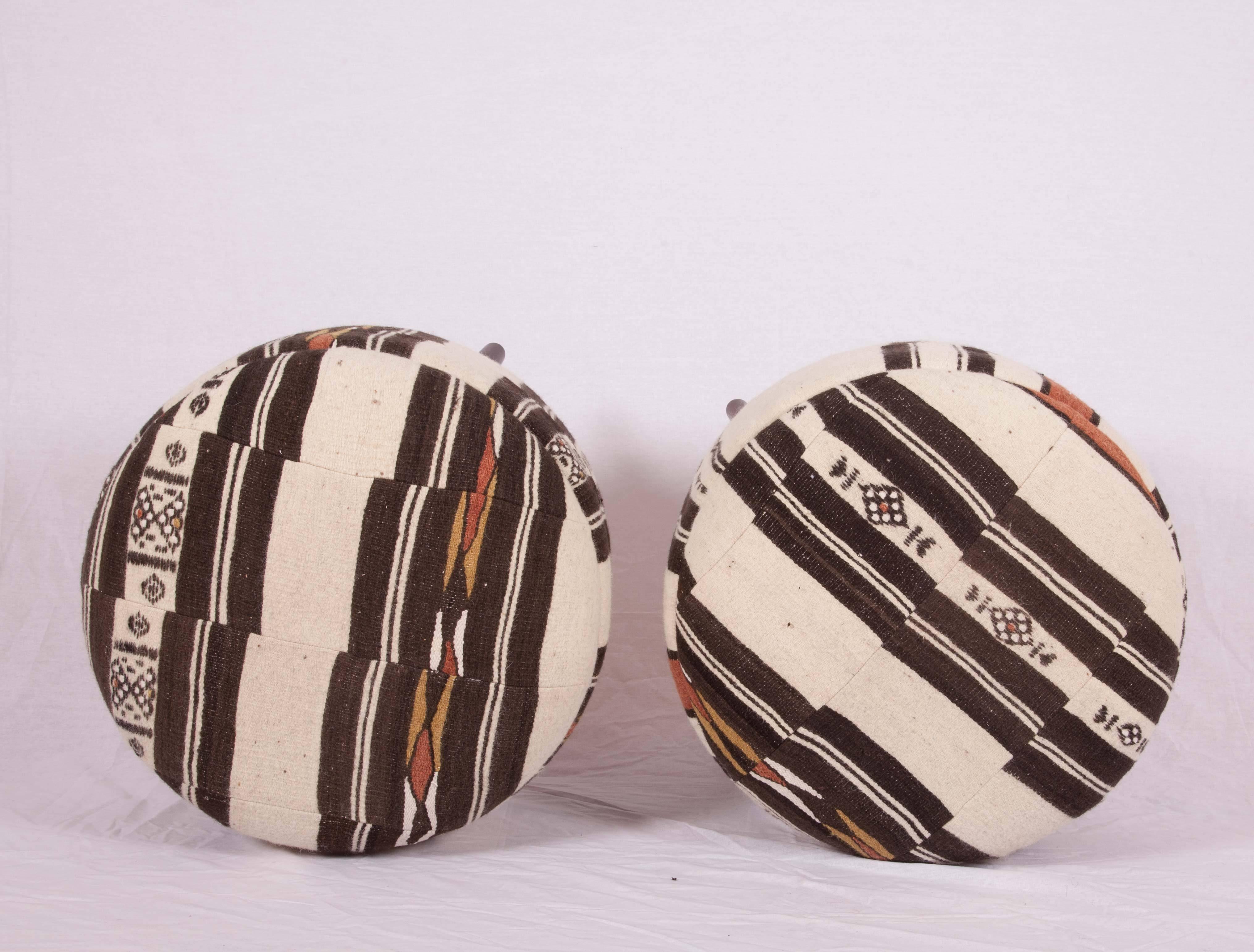 Ottomans of Poufs upholsered with a vintage Fulani from Mali Africa.