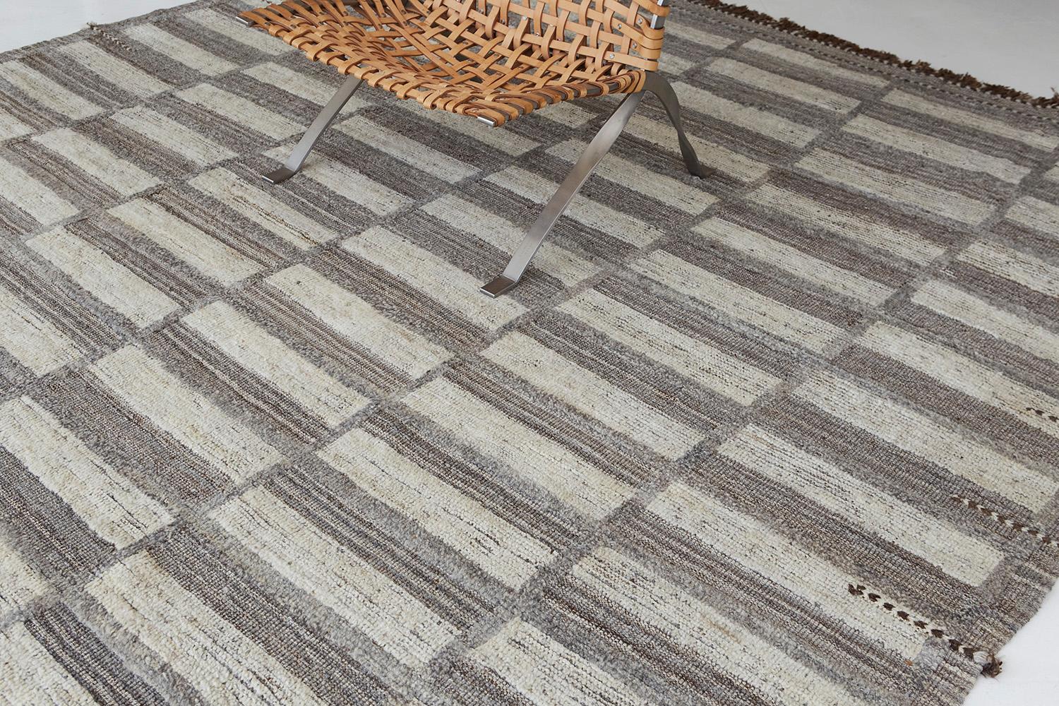 Oudu' is a color-blocking hand-knotted rug that brings movement and dimension to the space. The design is created with embossed detailing through the low shag pile. Inspired by Scandinavian design elements and designed in Los Angeles with extreme
