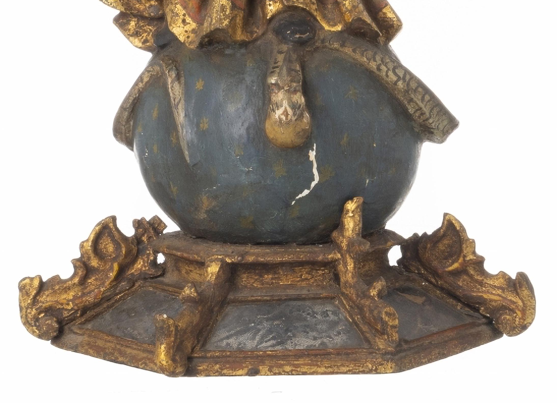 NOUS LADY OF CONCEPTION Sculpture indo-portugaise 18ème siècle

en bois polychrome avec la tête et les mains en iv...
La Vierge est représentée debout, les mains croisées en prière, sur une boule du monde avec un serpent. Couronne en métal doré.