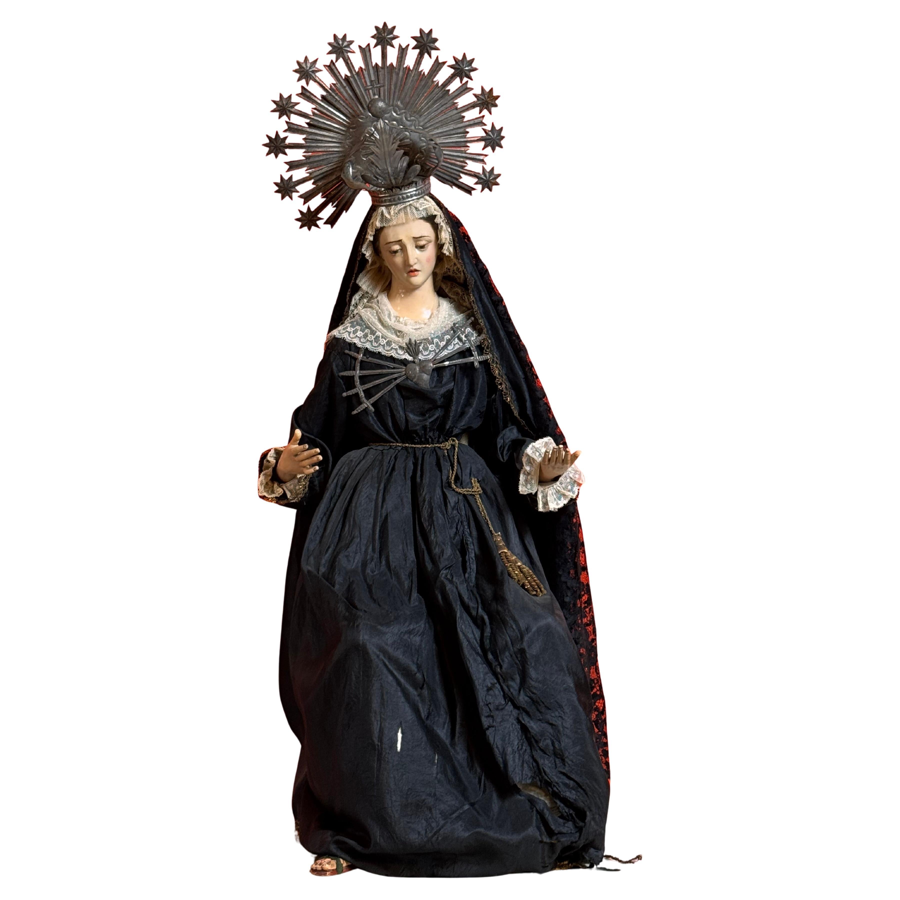 Our Lady of Sorrows, dressed in robes, 19th century.