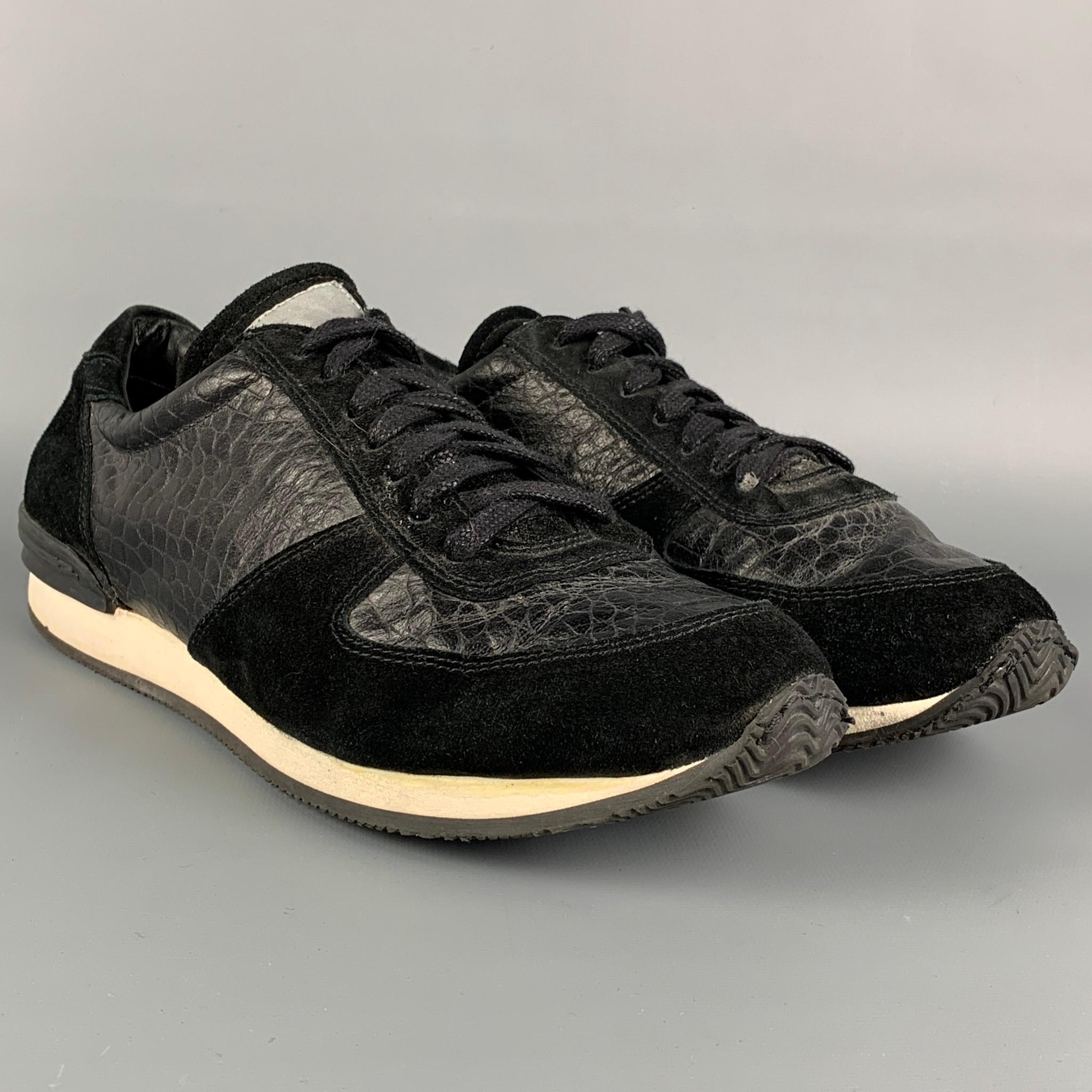 OUR LEGACY sneakers comes in a black embossed leather featuring a suede trim, rubber sole, and a lace up closure. 

Good Pre-Owned Condition.
Marked: 23 2812 44

Outsole: 12 in. x 4 in. 