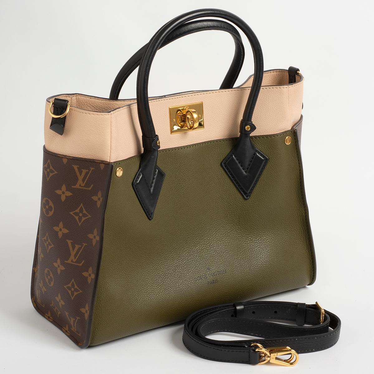 Our Louis Vuitton 'On My Side' Handbag comes in Laurier Green; Toffee Latte Beige with Monogram. This reference benefits from a capacious interior with multiple compartments and presented in superb condition with only light signs of use, this bag