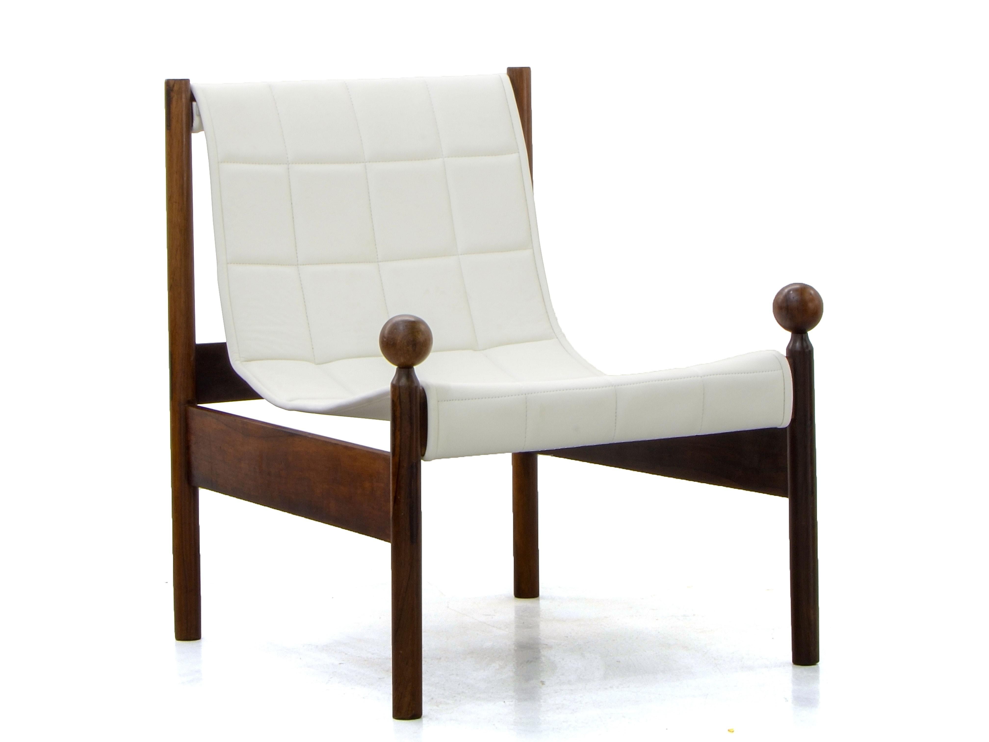 This Lounge Chair was designed by Jorge Zalszupin in the Brazilian Midcentury design. 

Originally born in Poland, Jorge Zalszupin built his entire career in Brazil, where he's absorbed many influences for his design, especially the care and