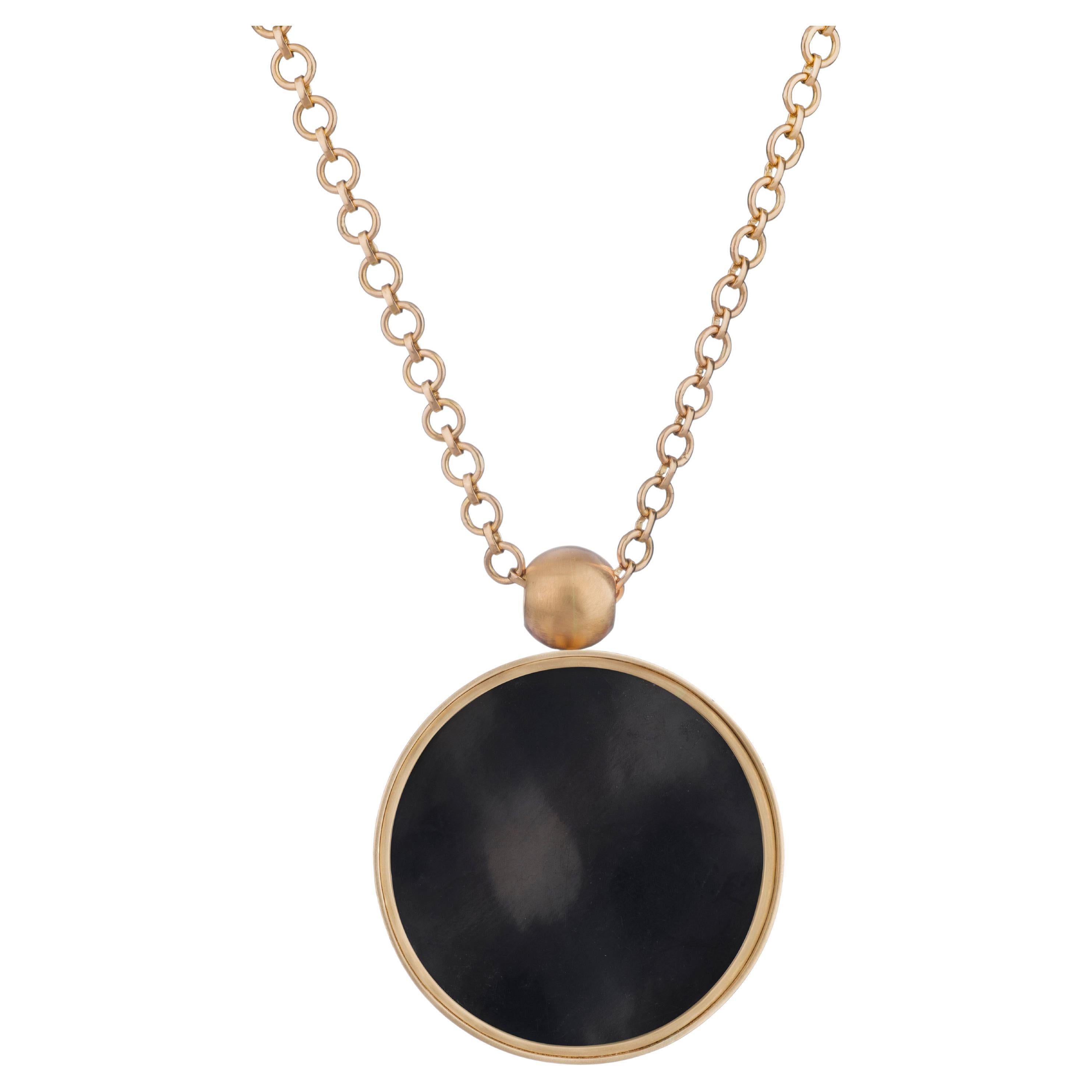 Ouroboros' 18kt Gold Black Shell and Mother of Pearl Pendant For Sale