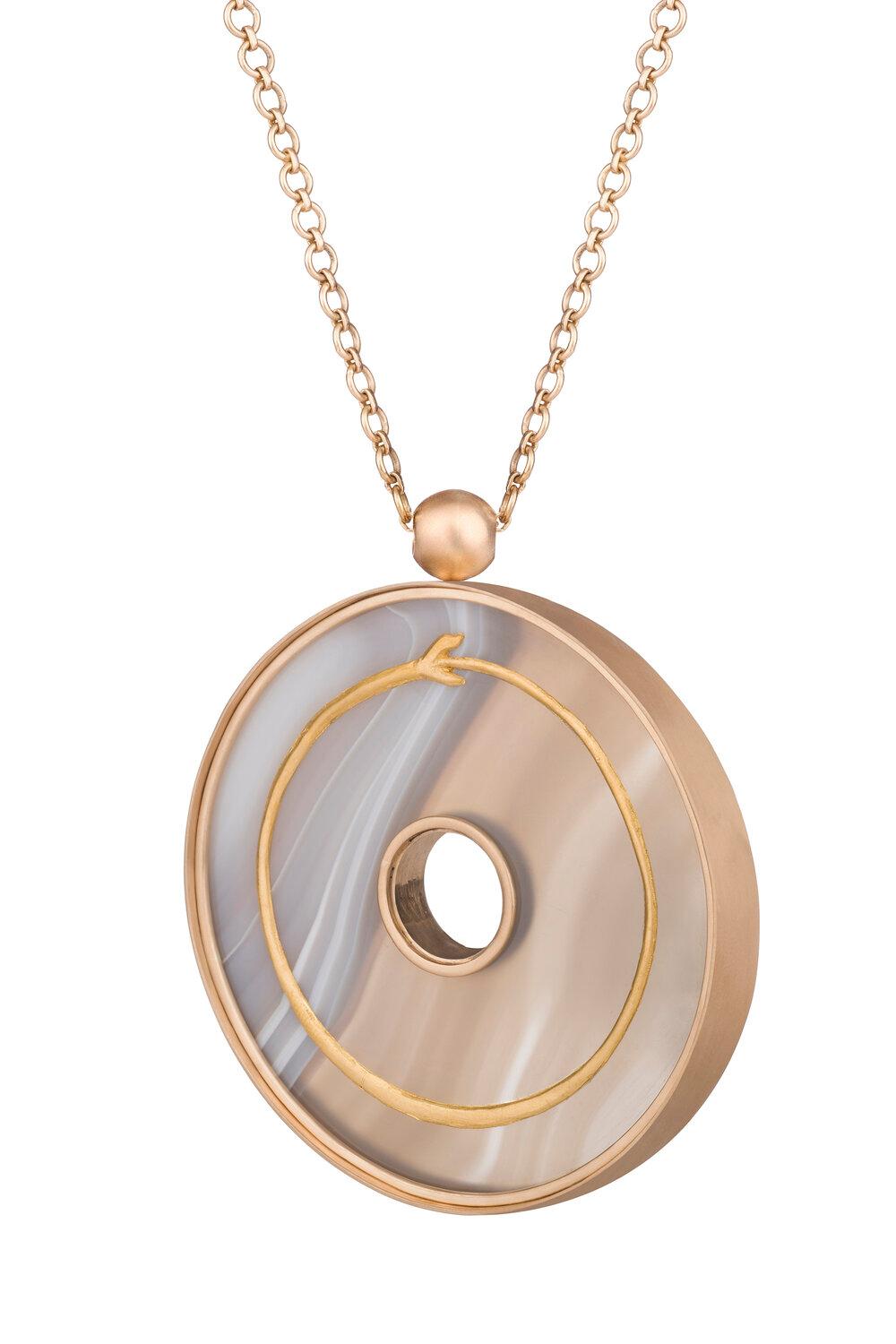 OUROBOROS veined agate pendant set in 18kt gold.

There are four chain options, all are handmade, 36