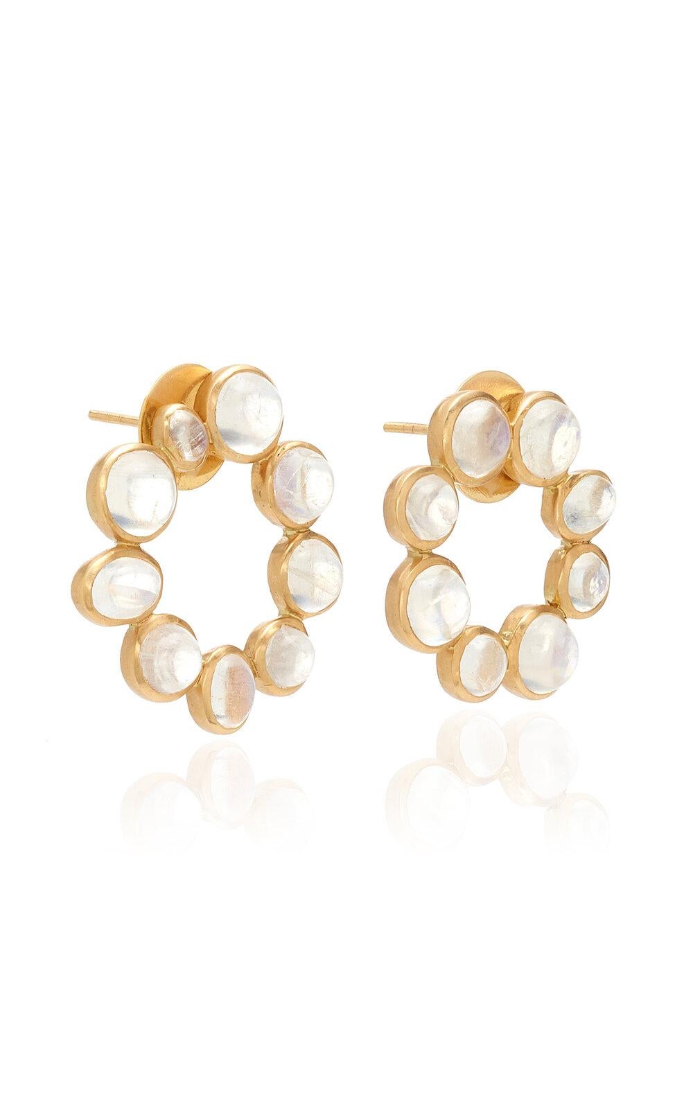 OUROBOROS' 'Round and Round,' cabochon rainbow moonstones set in 18kt gold.

OUROBOROS’ commitment to using only the most unique stones set in 18 or 24 Karat gold, is matched only to Olivia’s commitment to the conditions and treatment of her