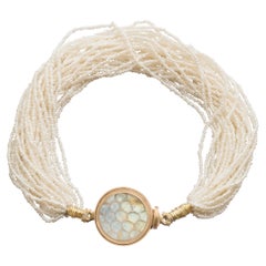 Used Ouroboros Rainbow Moonstone and Seed Pearl Bracelet set in Gold