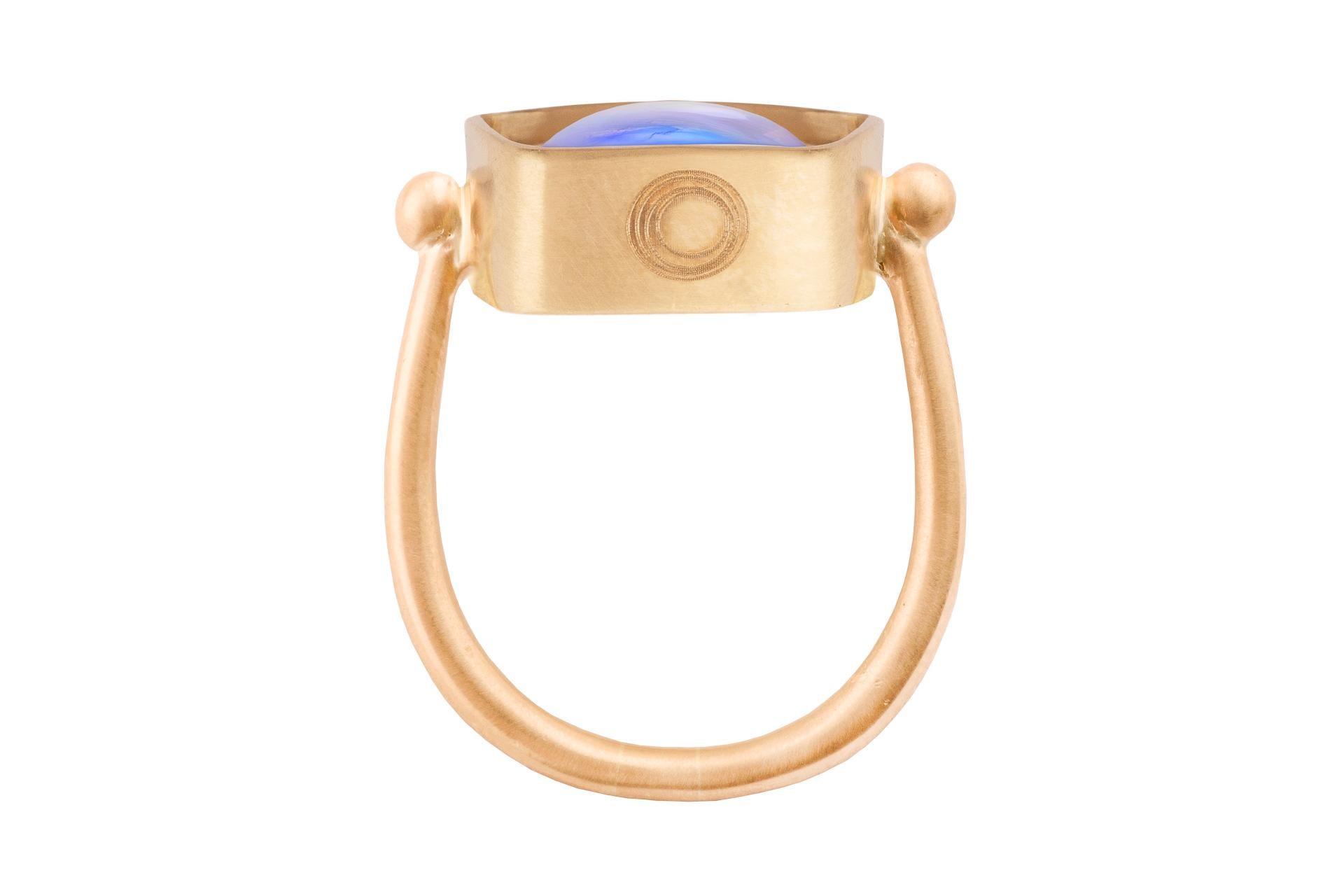 Modern Ouroboros Rainbow Moonstone Ring set in 18kt Gold For Sale