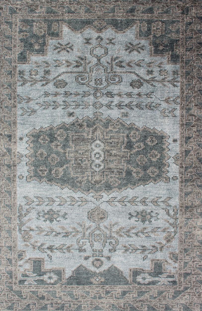 Oushak design rug in gray, taupe, cream geometric medallion design, rug/OB-10456128, country of origin / type: India/ Oushak

This hand knotted Oushak rug features a beautiful medallion design rendered in cream, light brown/taupe, and soft gray.