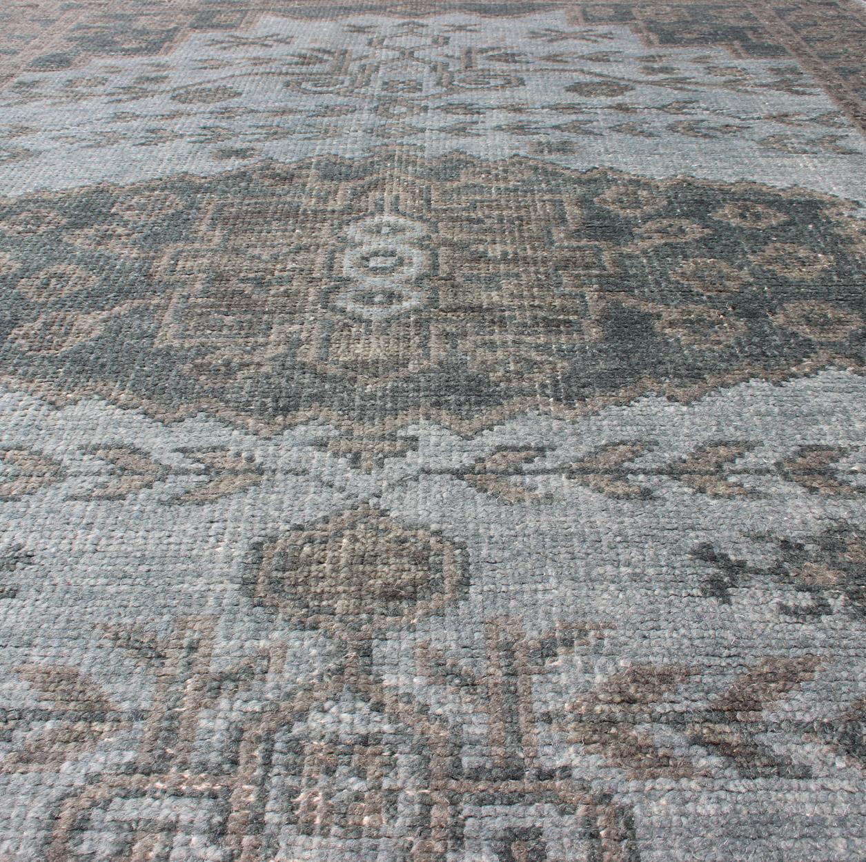 Wool Oushak Design Distressed Rug in Gray, Taupe, & Cream with large Medallion Design
