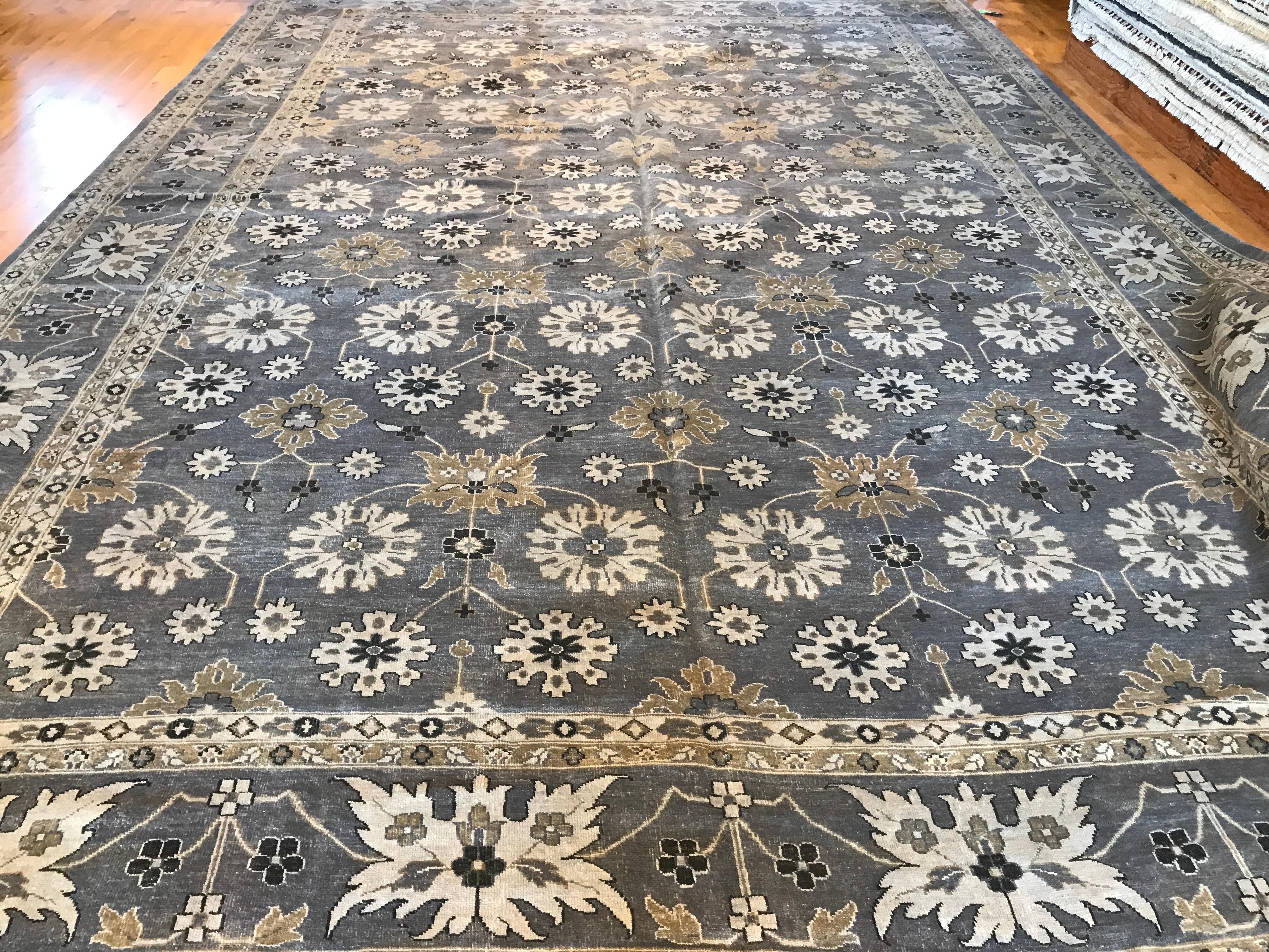 This Indian Oushak rug features a reds floral design  allowing you to switch up your decor. Add a touch of style to any room while also having the option to change things up to suit your mood. Beautiful and versatile, this rug is a must-have for any