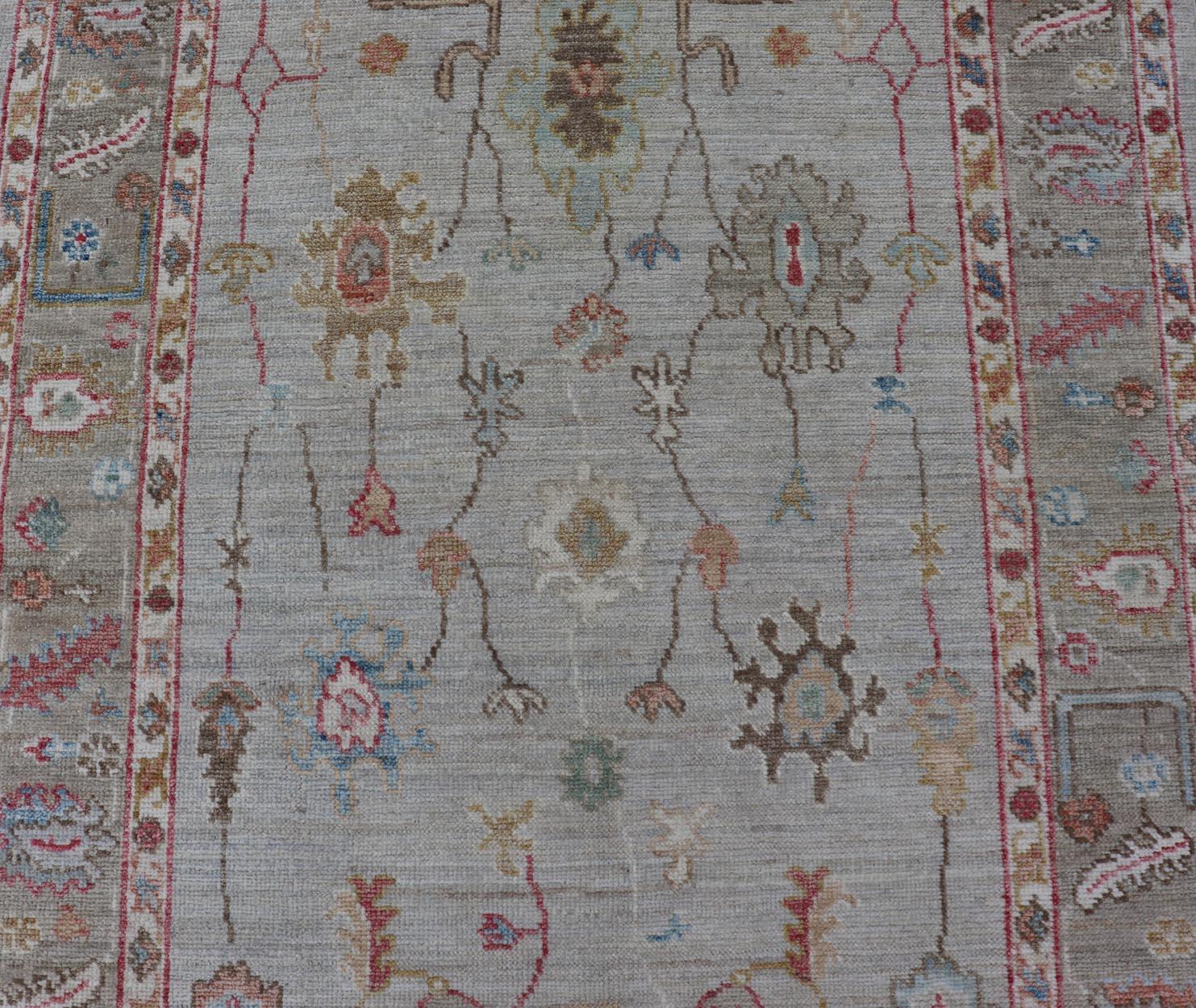 Hand-Knotted Oushak Gallery Rug with Soft Ivory Field and Accents in Light Blue 4'0 x 10'2 For Sale