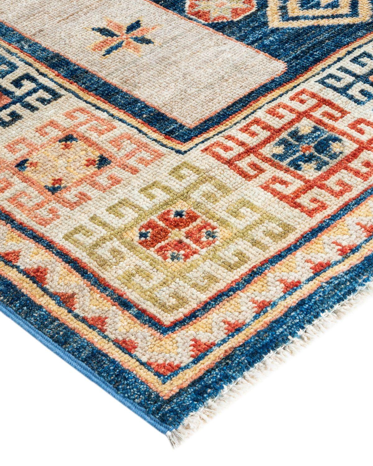 The rich textile tradition of western Africa inspired the Tribal collection of hand knotted rugs. Incorporating a medley of geometric motifs, in palettes ranging from earthy to vivacious, these rugs bring a sense of energy as well as plush texture