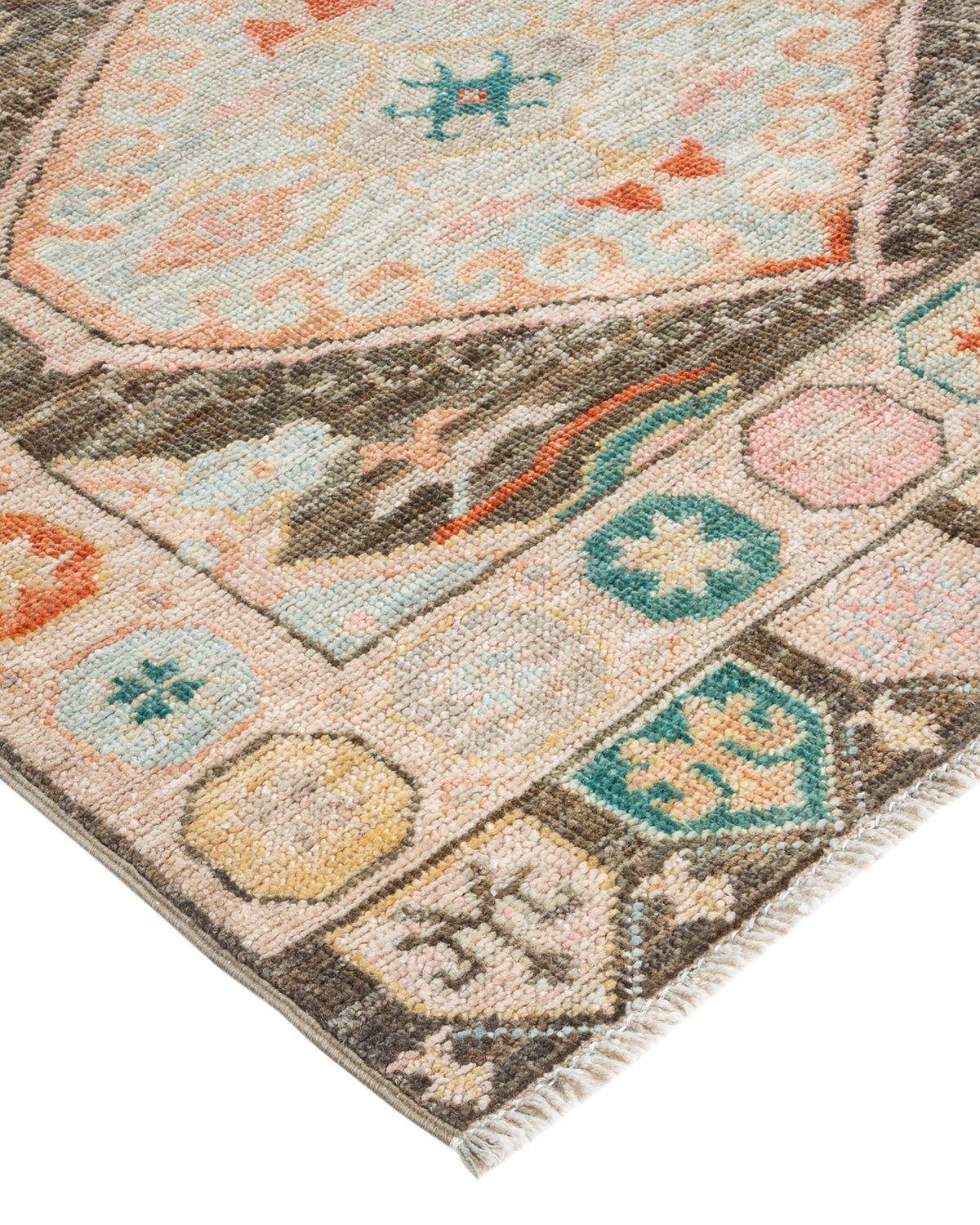 The rich textile tradition of western Africa inspired the Tribal collection of hand knotted rugs. Incorporating a medley of geometric motifs, in palettes ranging from earthy to vivacious, these rugs bring a sense of energy as well as plush texture