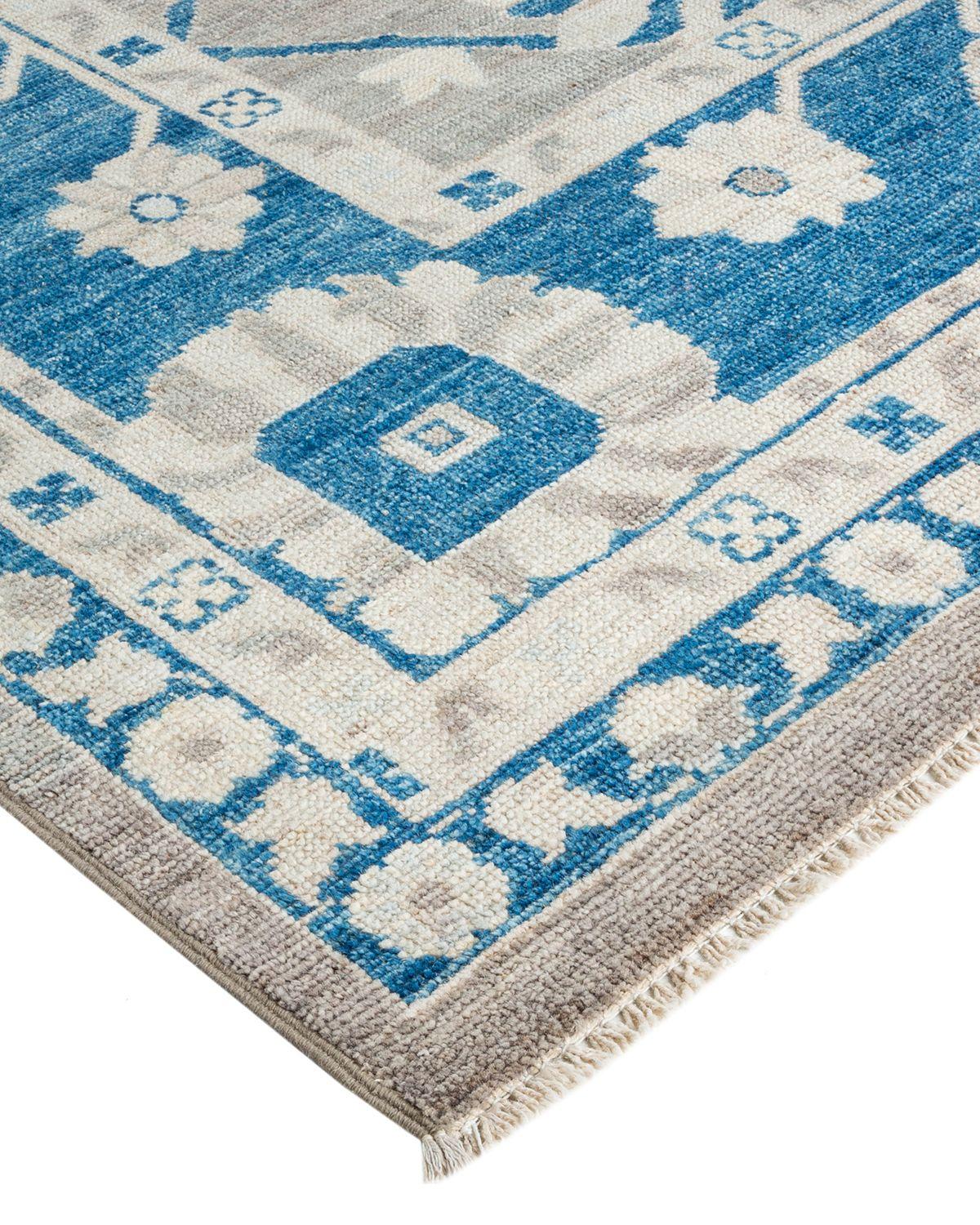 The rich textile tradition of western Africa inspired the Tribal collection of hand knotted rugs. Incorporating a medley of geometric motifs, in palettes ranging from earthy to vivacious, these rugs bring a sense of energy as well as plush texture
