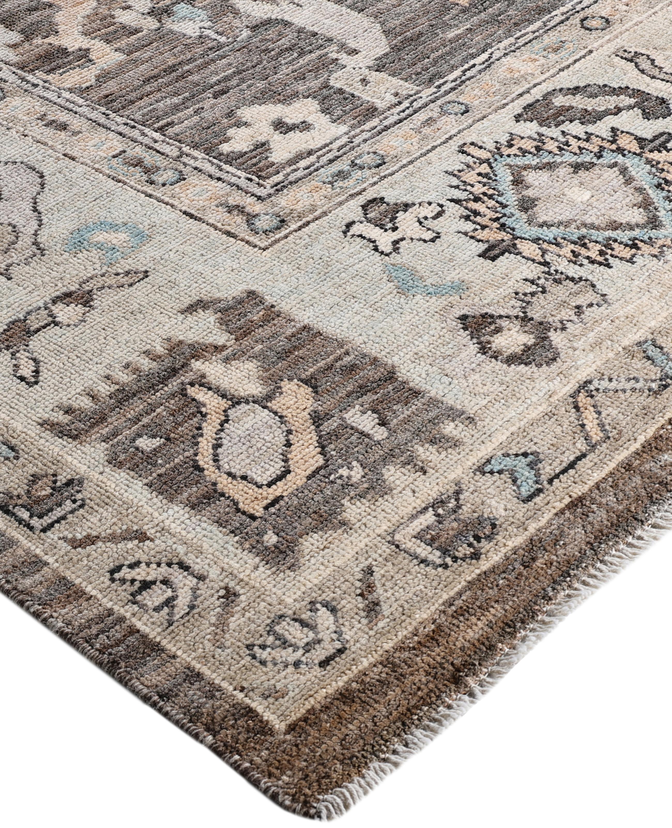 Oushak rugs are known for their soft, muted color palettes and large-scale, flowing designs. They often feature soft tones like beige, cream, gold, and light blue, with motifs that include palmettes, vines, and geometric shapes. These rugs are
