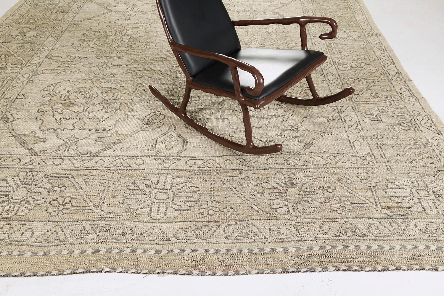 This dashing hand-spun wool revival of Oushak Rug features all stylized symbolic elements and medallions are embodied with this design. It creates a soulful balance of everything from mid-century modern decor to old-fashioned design through a