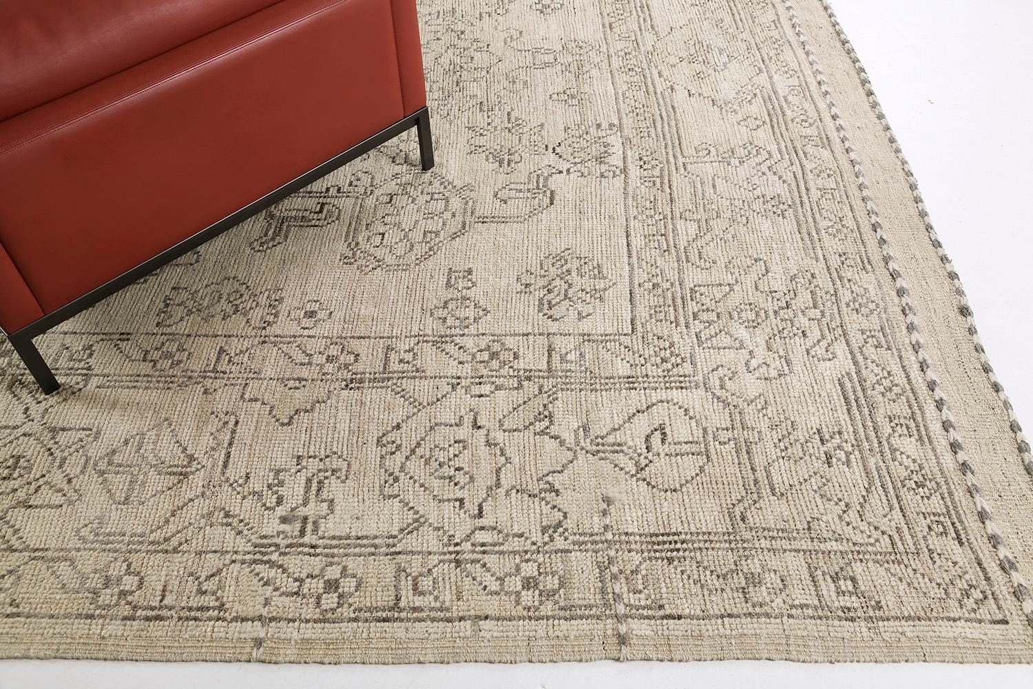 This dashing hand-spun wool revival of Oushak Rug features all stylized symbolic elements and medallions are embodied with this design. It creates a soulful balance of everything from mid-century modern decor to old-fashioned design through a