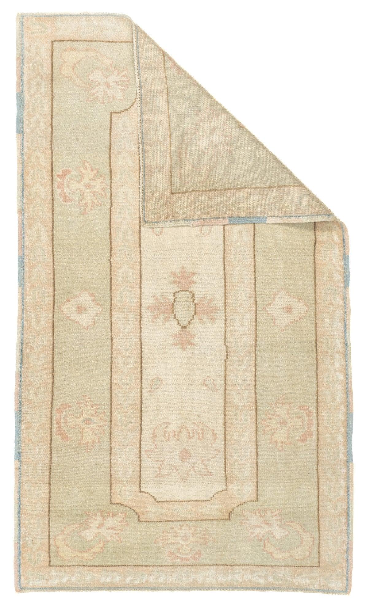 Oushak Rug 2'8'' x 4'7''. Town in Western Anatolia, weaving mostly room sizes, in coarse to moderate weave, high pile. Antiques are all wool, changing to cotton foundations in the 1920's. Geometric or Persian-derived patterns, soft or strong