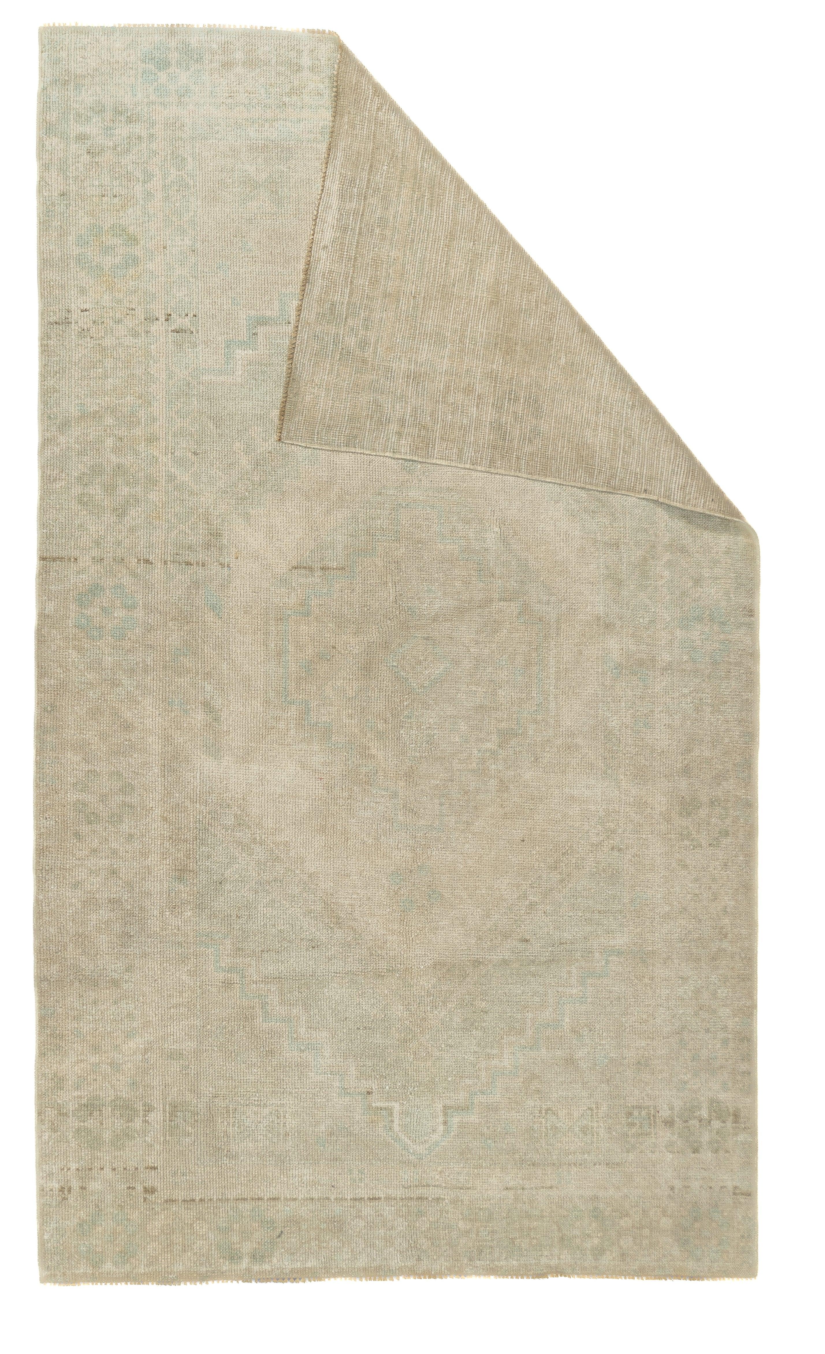 Oushak Rug 3'9'' x 6'6''. Town in Western Anatolia, weaving mostly room sizes, in coarse to moderate weave, high pile. Antiques are all wool, changing to cotton foundations in the 1920's. Geometric or Persian-derived patterns, soft or strong