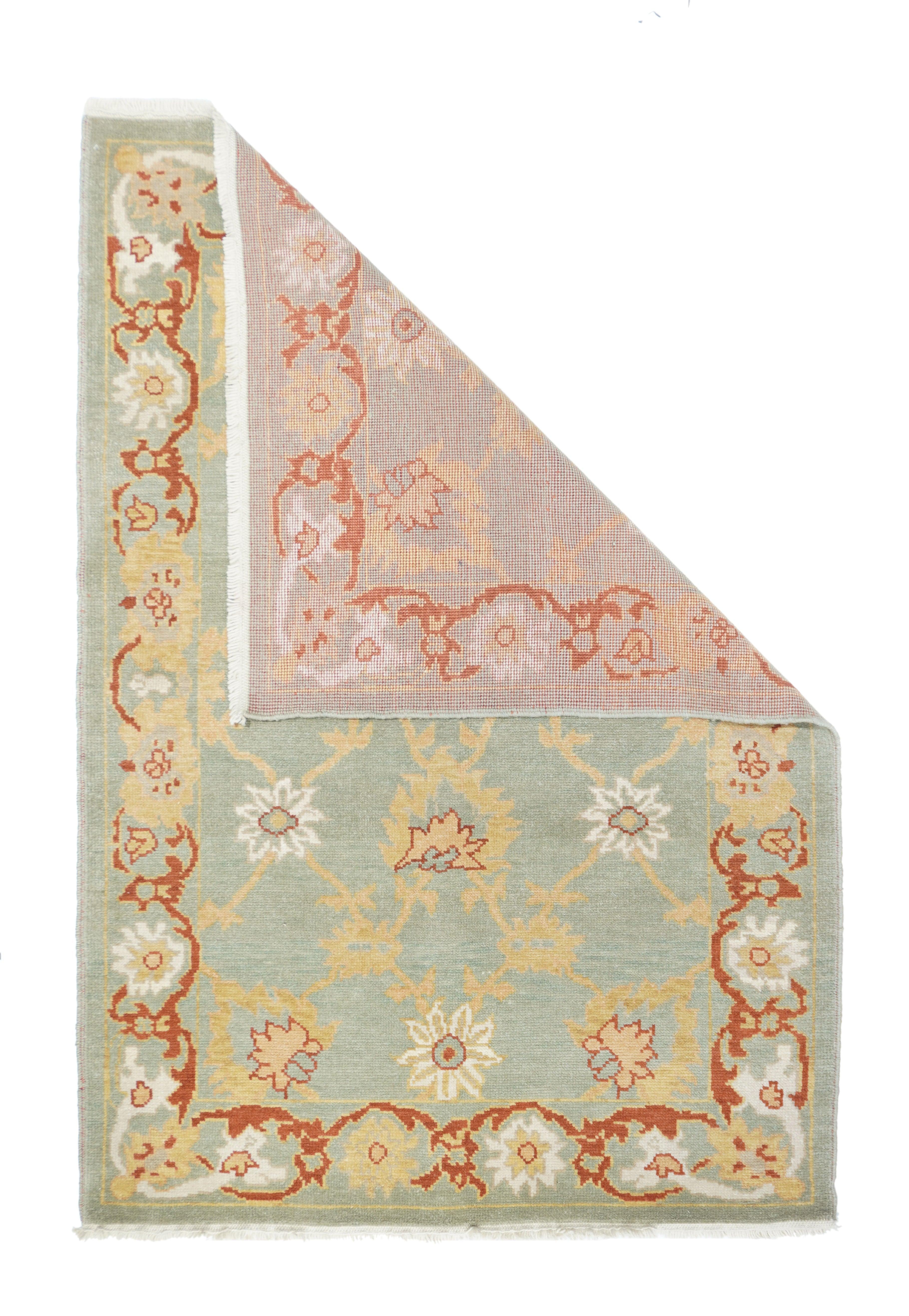 Oushak Rug 4'1'' x 6'1''. Town in Western Anatolia, weaving mostly room sizes, in coarse to moderate weave, high pile. Antiques are all wool, changing to cotton foundations in the 1920’s. Geometric or Persian-derived patterns, soft or strong