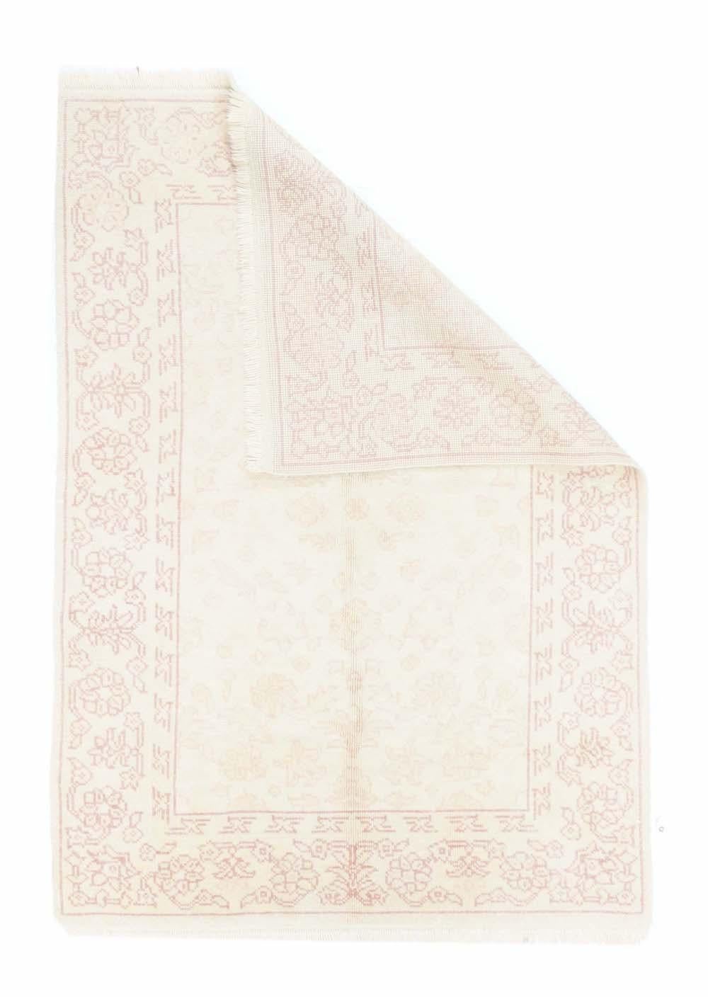 Oushak Rug 4'1'' x 6'6''. With a very restrained palette, this coarsely-woven, high pile scatter has an ecru field with an allover shadow pattern. The ecru border displays various stencil palmettes. Recent. As new condition.