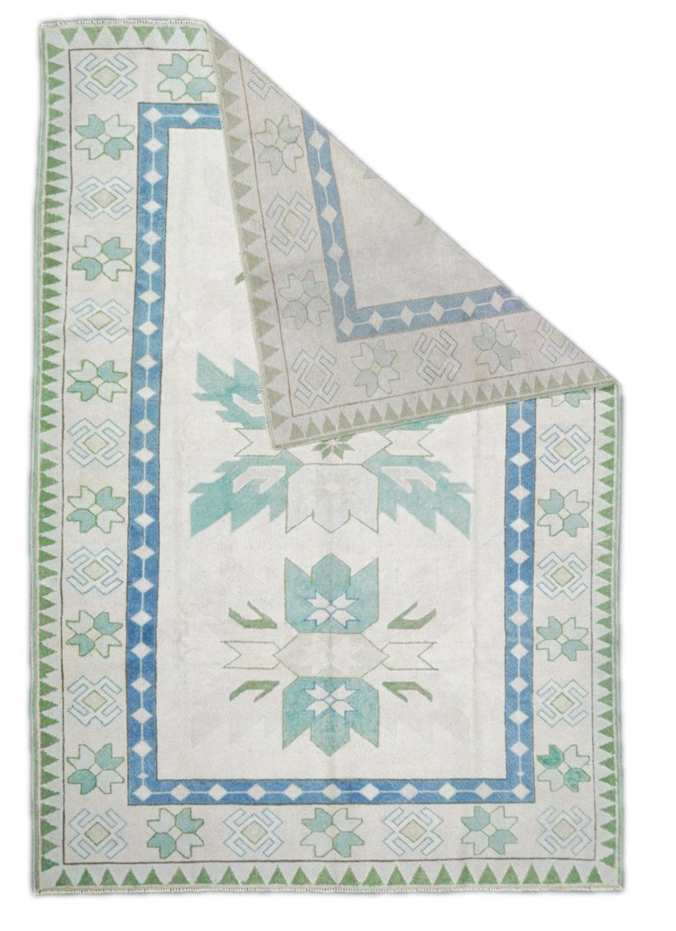 Oushak Rug 5'9'' x 8'4''. Town in Western Anatolia, weaving mostly room sizes, in coarse to moderate weave, high pile. Antiques are all wool, changing to cotton foundations in the 1920's. Geometric or Persian-derived patterns, soft or strong