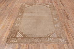 Alfombra Oushak, tonos marrones, hacia 1940