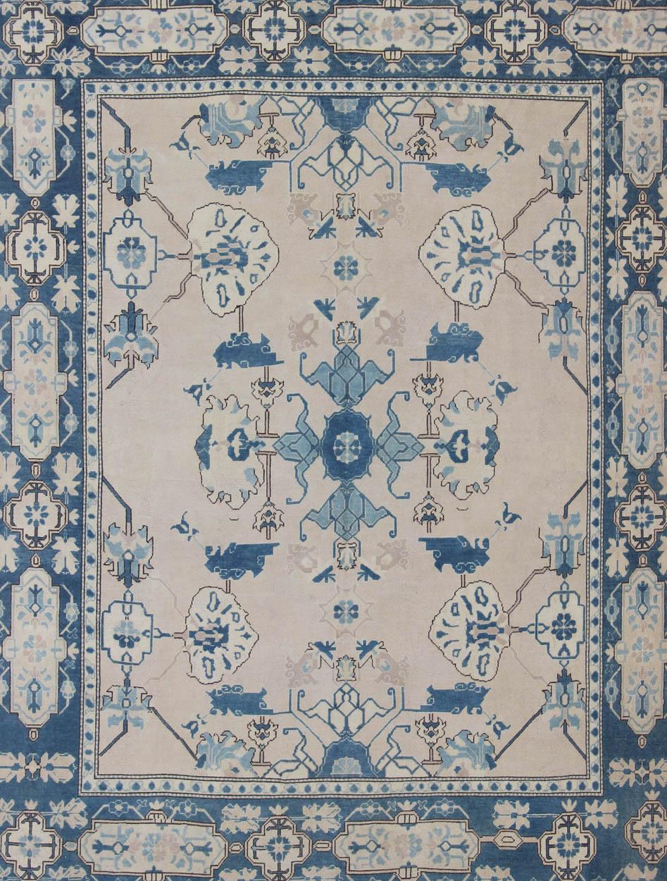 Turkish Oushak Rug from Mid-20th Century Turkey with Blue and Cream Tribal Design For Sale