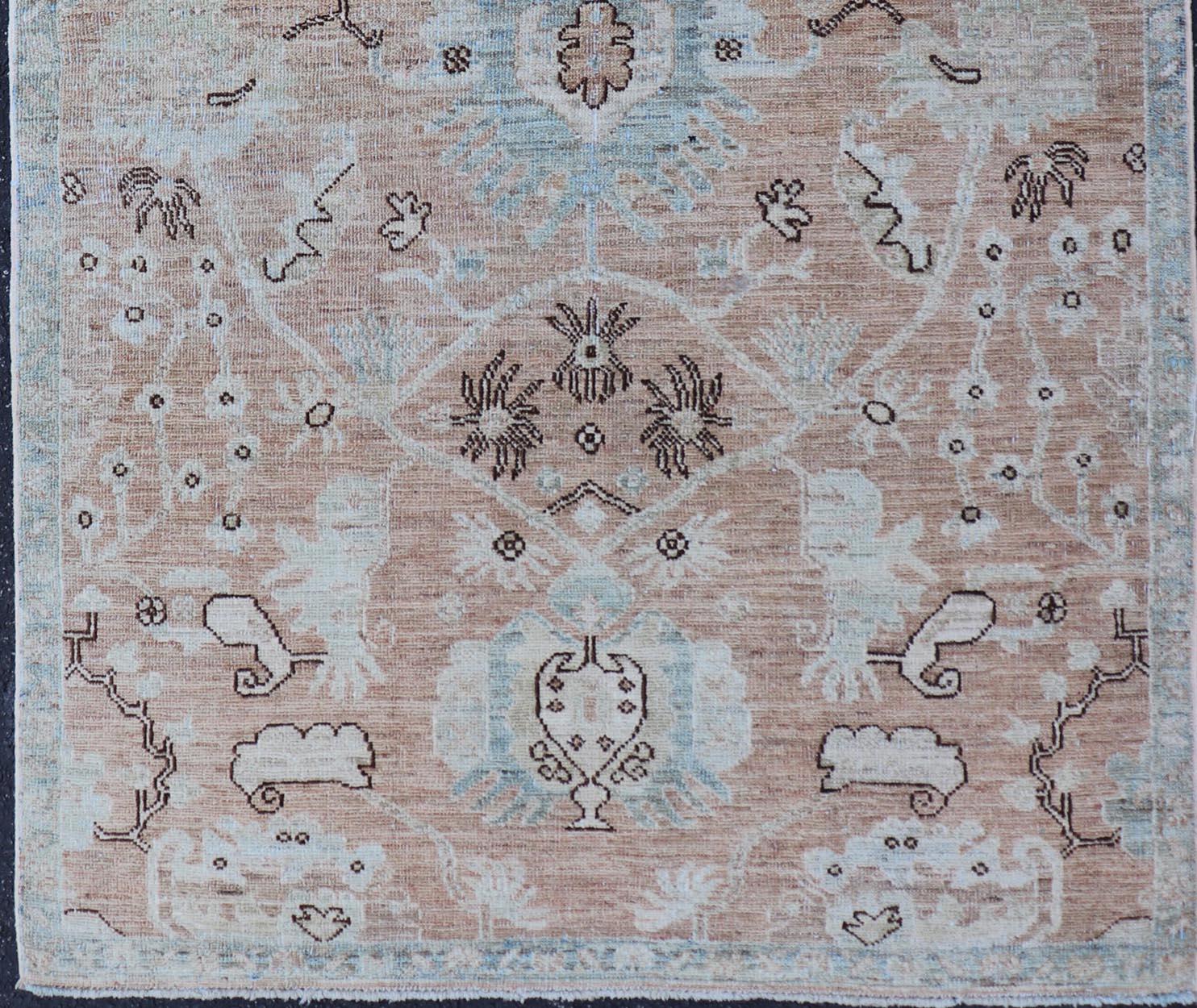 Afghan Oushak Rug with a Warm Apricot Base and Accents of Sky Blue, Ivory 3'3 x 5'0 For Sale