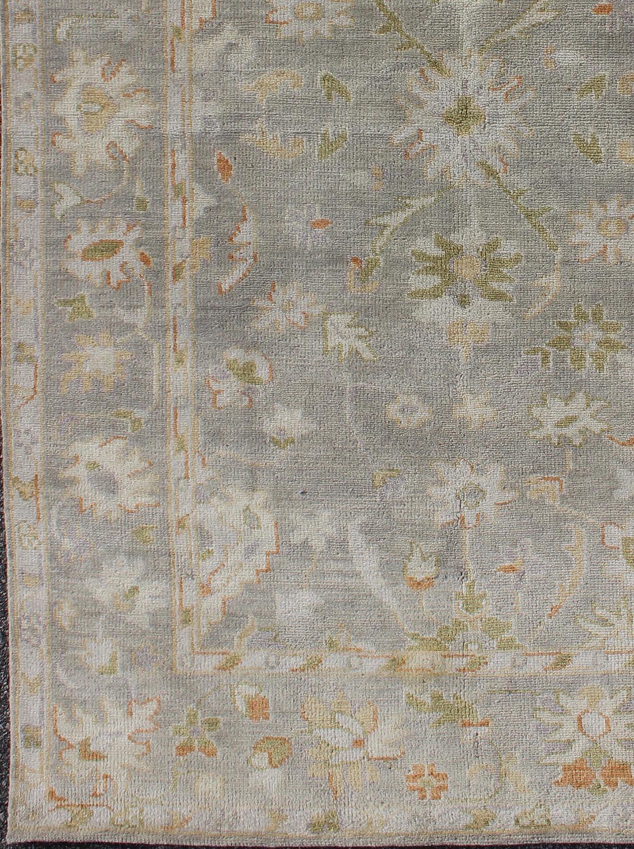 Indian Oushak Rug with Floral Design in Gray Background, Chartreus Green, Cream, Red For Sale