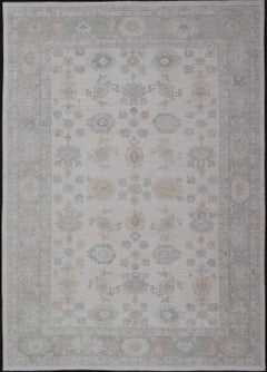 Alfombra Oushak con Acentos Pastel Suaves Marfil en Salvia, Melocotón y Azul 12'3 x 17'10