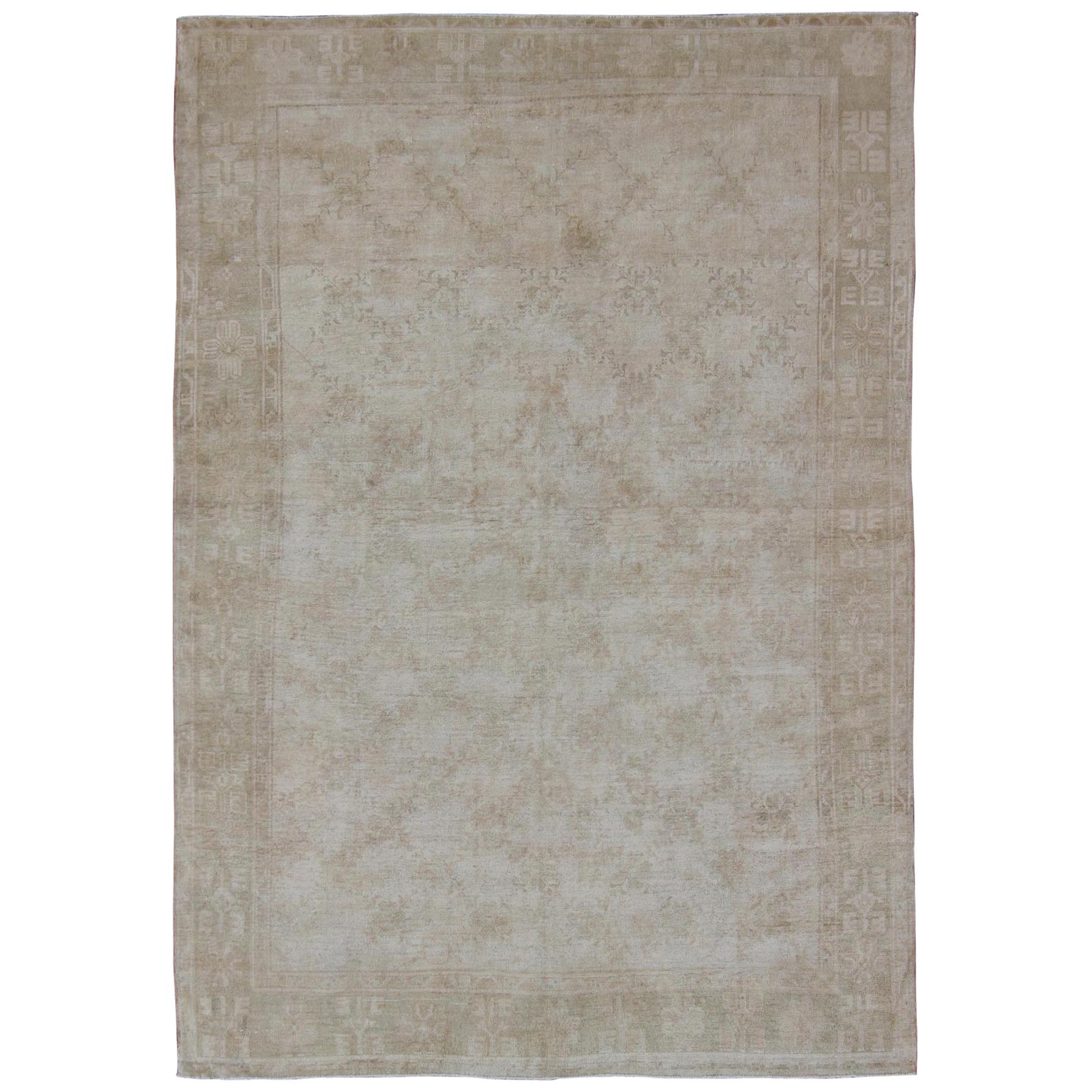 Oushak Rug with Light Color Palette and Repeating Flower Pattern