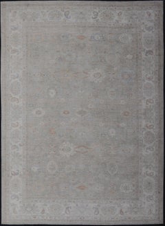 Oushak Teppich mit gedämpften Sage Grün Basis und subtilen Pastell Akzenten 13'6 x 19'0