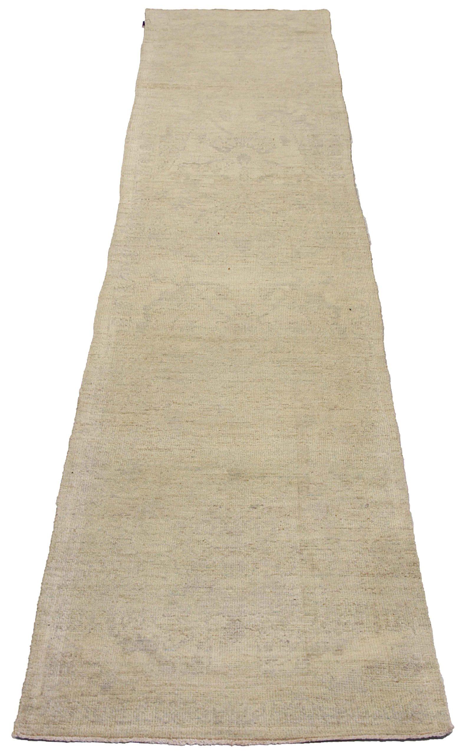 Discover the elegance of this unique Oushak featuring Runner Rug in Circa 1990. Designed with meticulous attention to detail, this exclusive design is perfect for enhancing your space.
