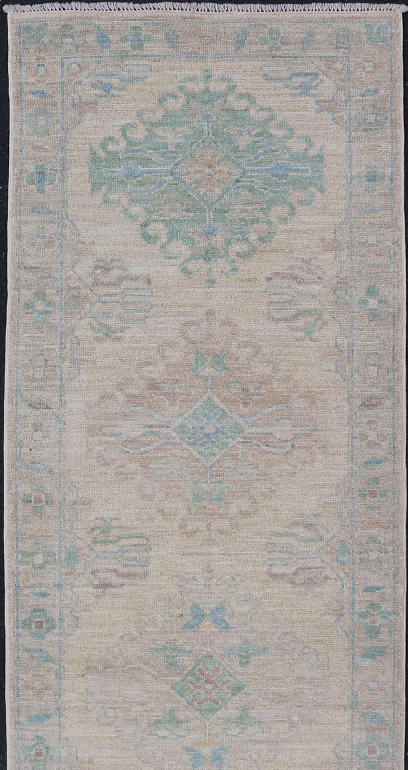 Oushak Runner with Medallion Design on a Cream Field with Blues and Green In New Condition In Atlanta, GA